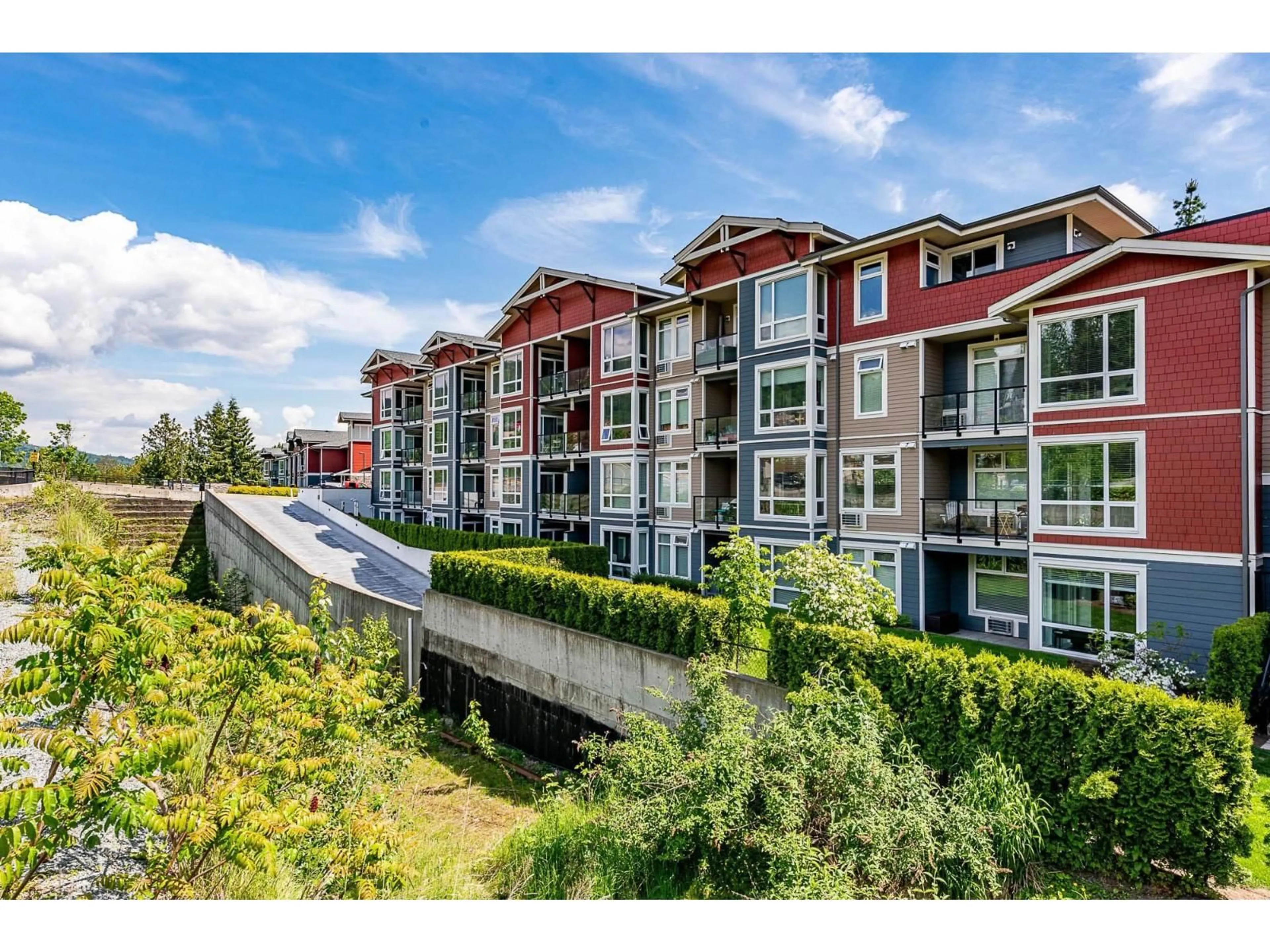 A pic from outside/outdoor area/front of a property/back of a property/a pic from drone, water/lake/river/ocean view for 101 - 2242 WHATCOM ROAD, Abbotsford British Columbia V3G0G3