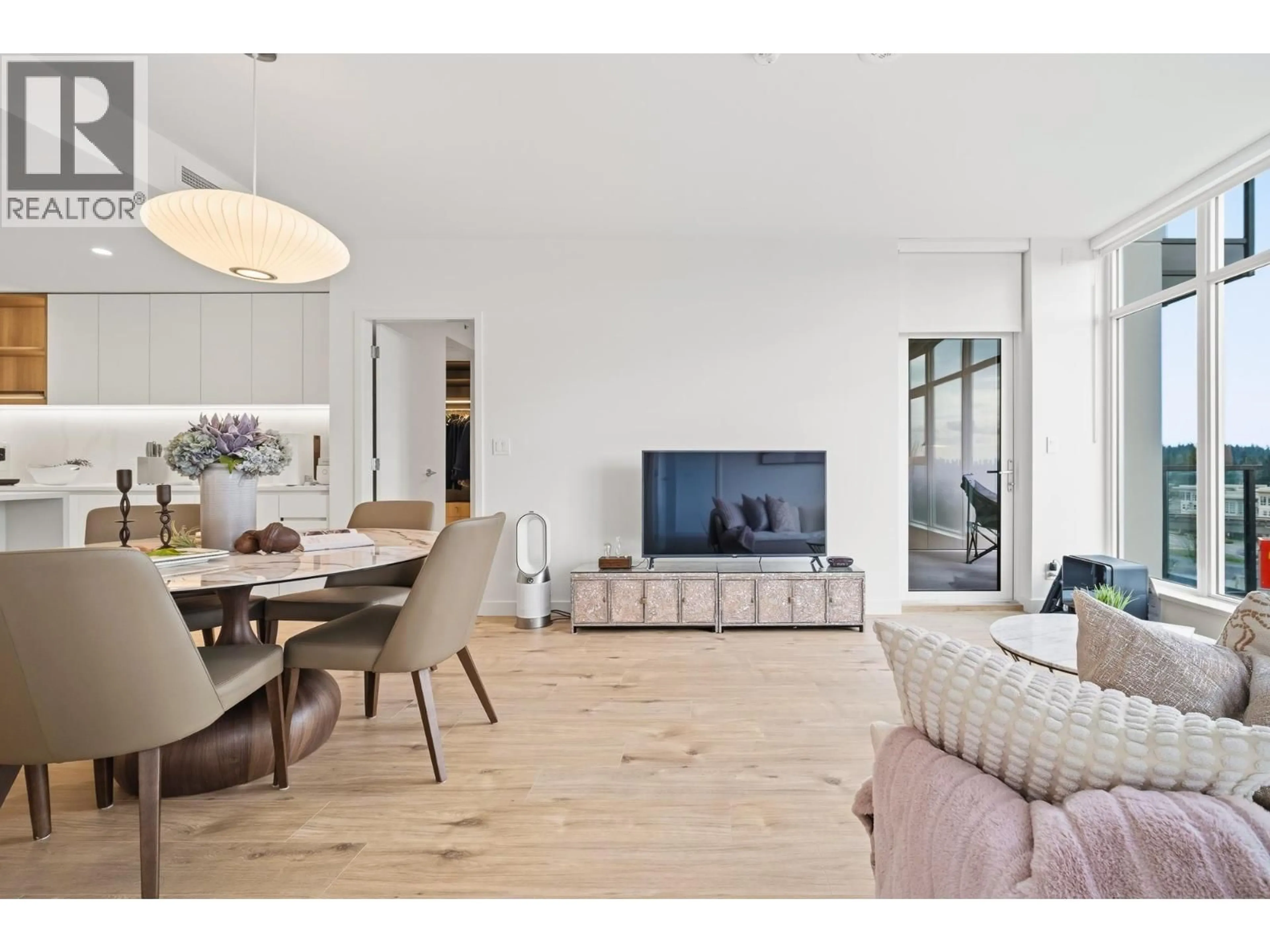 Living room with furniture, wood/laminate floor for 706 - 720 FARROW STREET, Coquitlam British Columbia V3J0P3