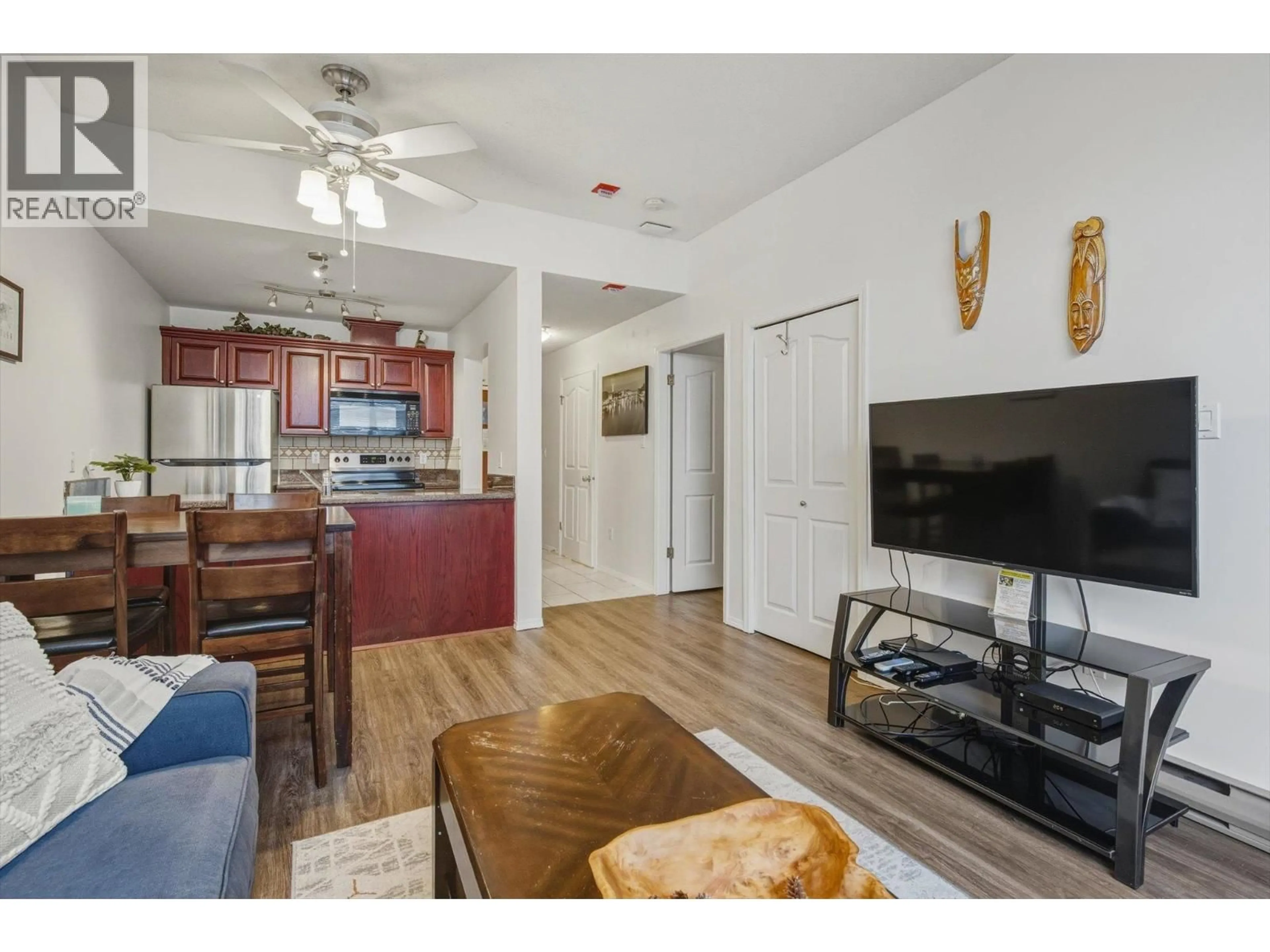Living room with furniture, wood/laminate floor for 106 - 4573 CHATEAU BOULEVARD, Whistler British Columbia V0N1B4
