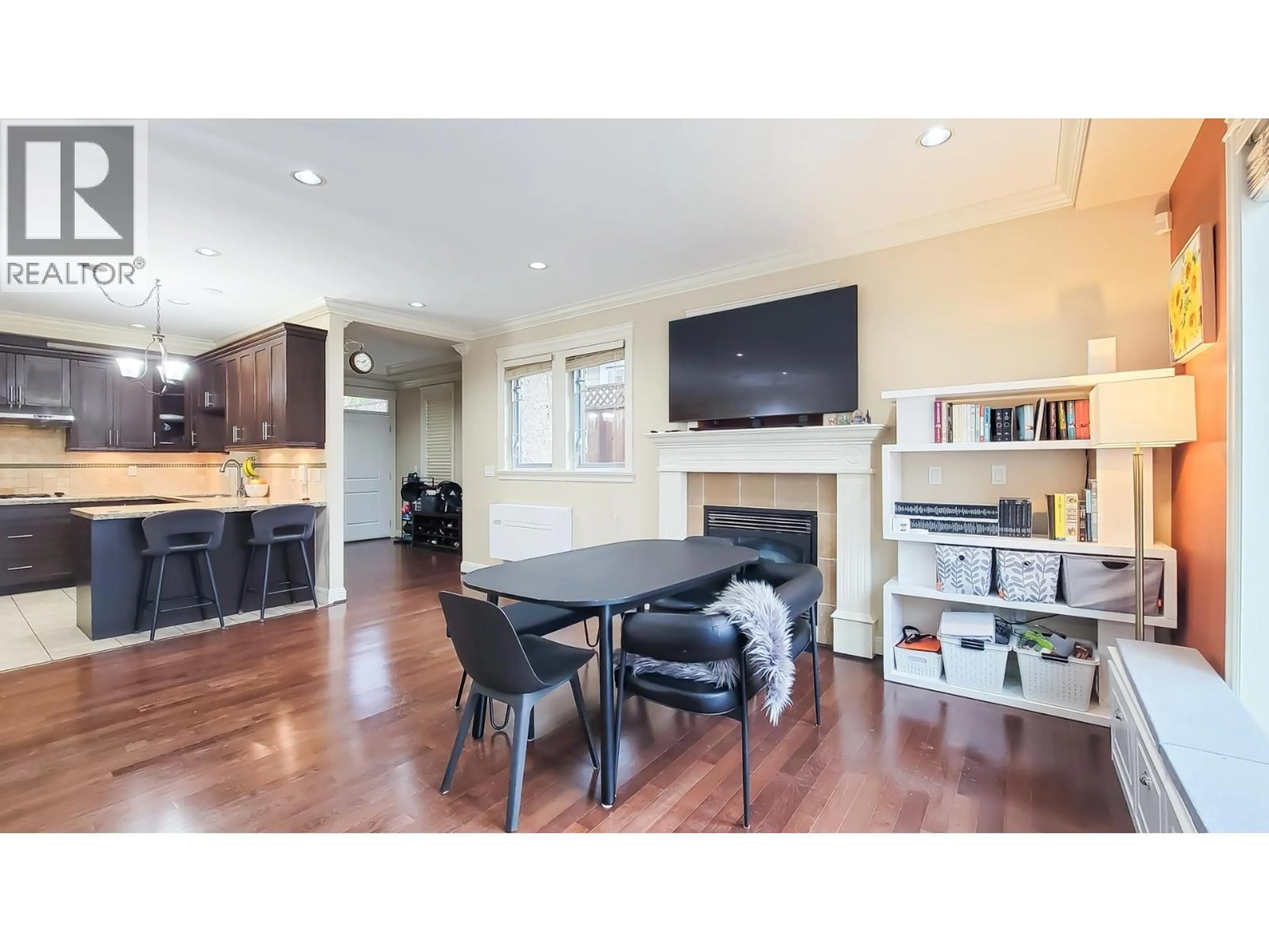 Open concept kitchen, wood/laminate floor for 203 18TH STREET, North Vancouver British Columbia V7L2X7