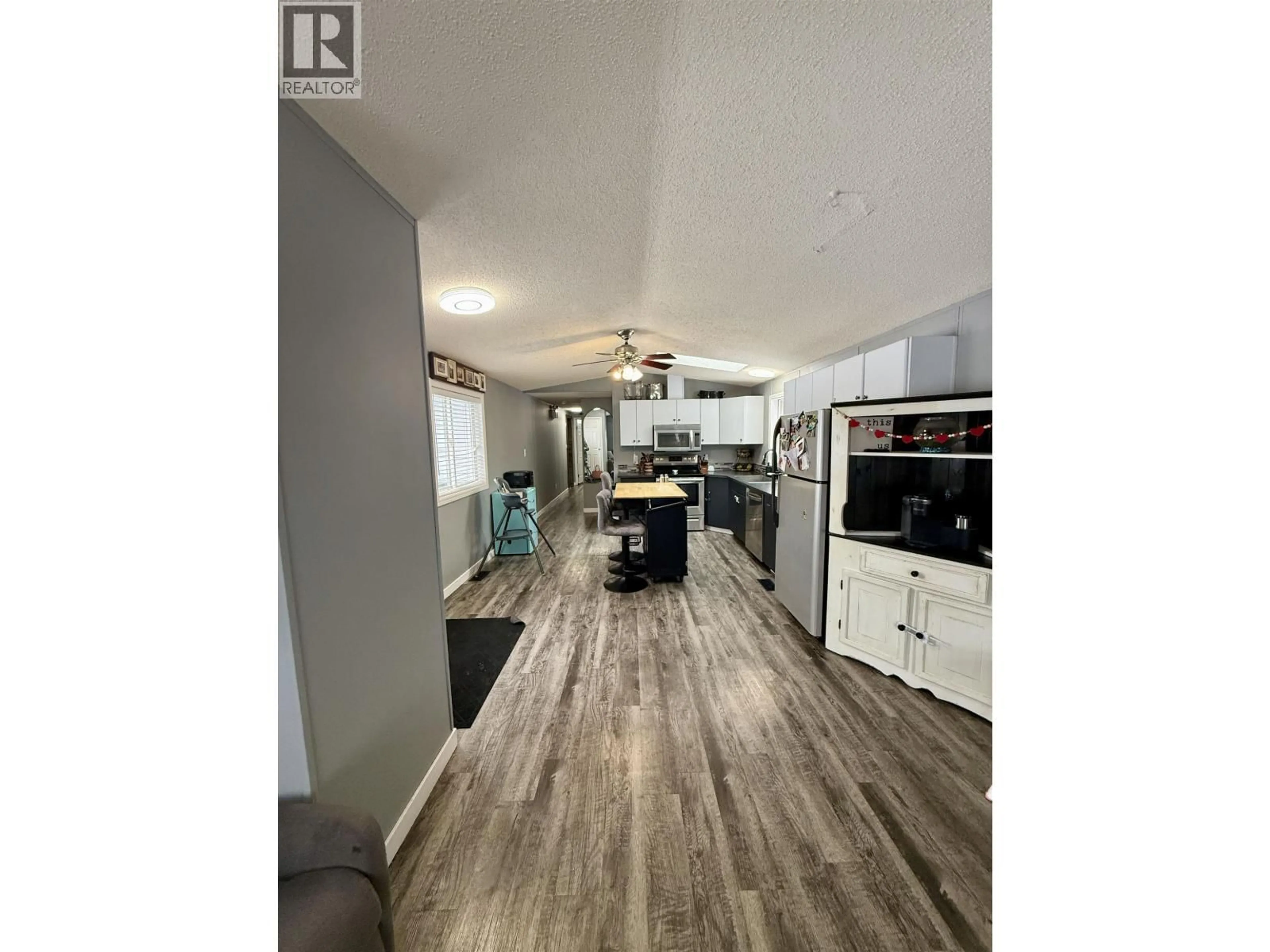 Open concept kitchen, wood/laminate floor for 1085 GROVEBURN ROAD, Prince George British Columbia V2N6W8