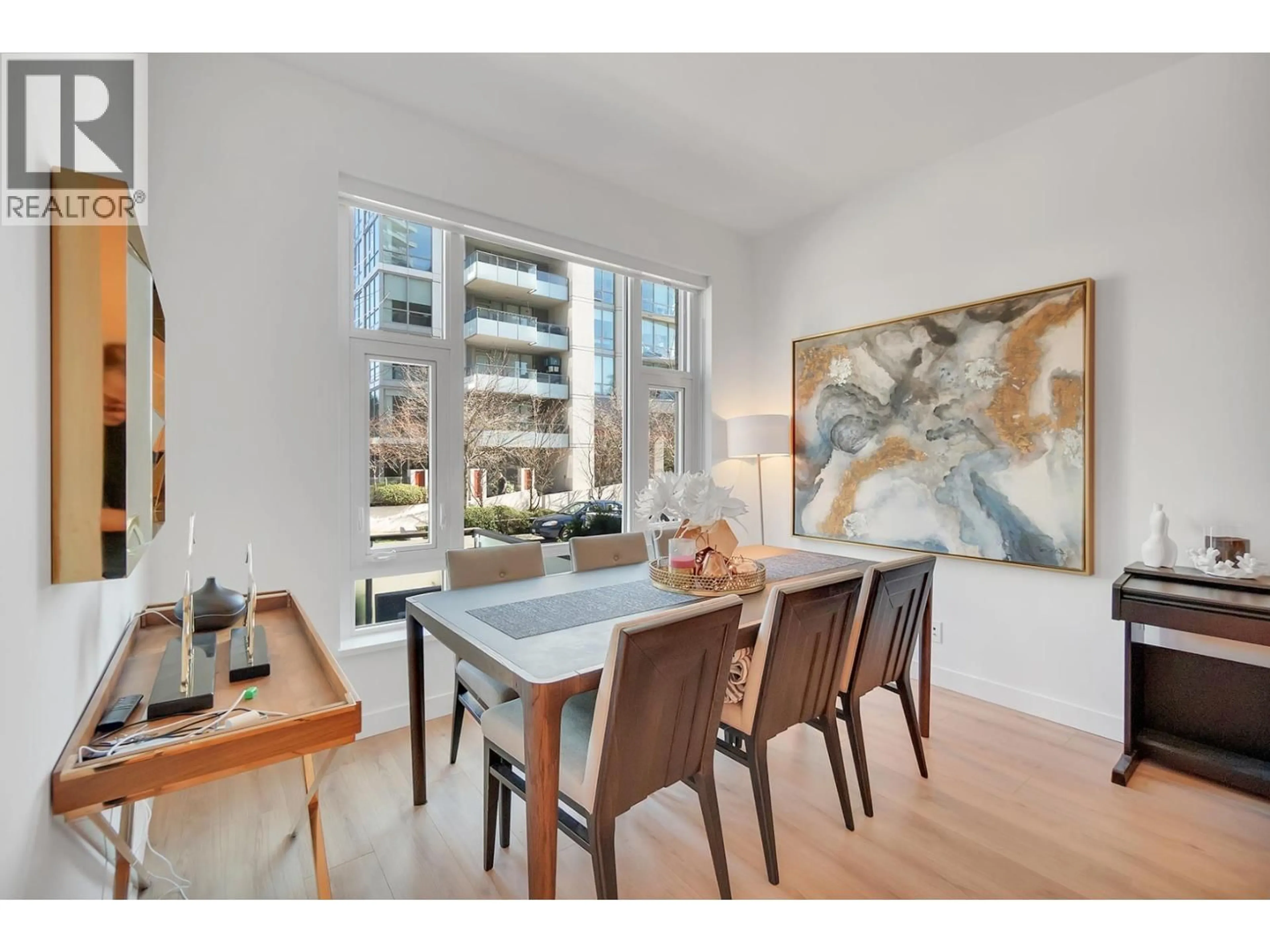 Dining room, wood/laminate floor for 107 - 1500 FERN STREET, North Vancouver British Columbia V7J0E6