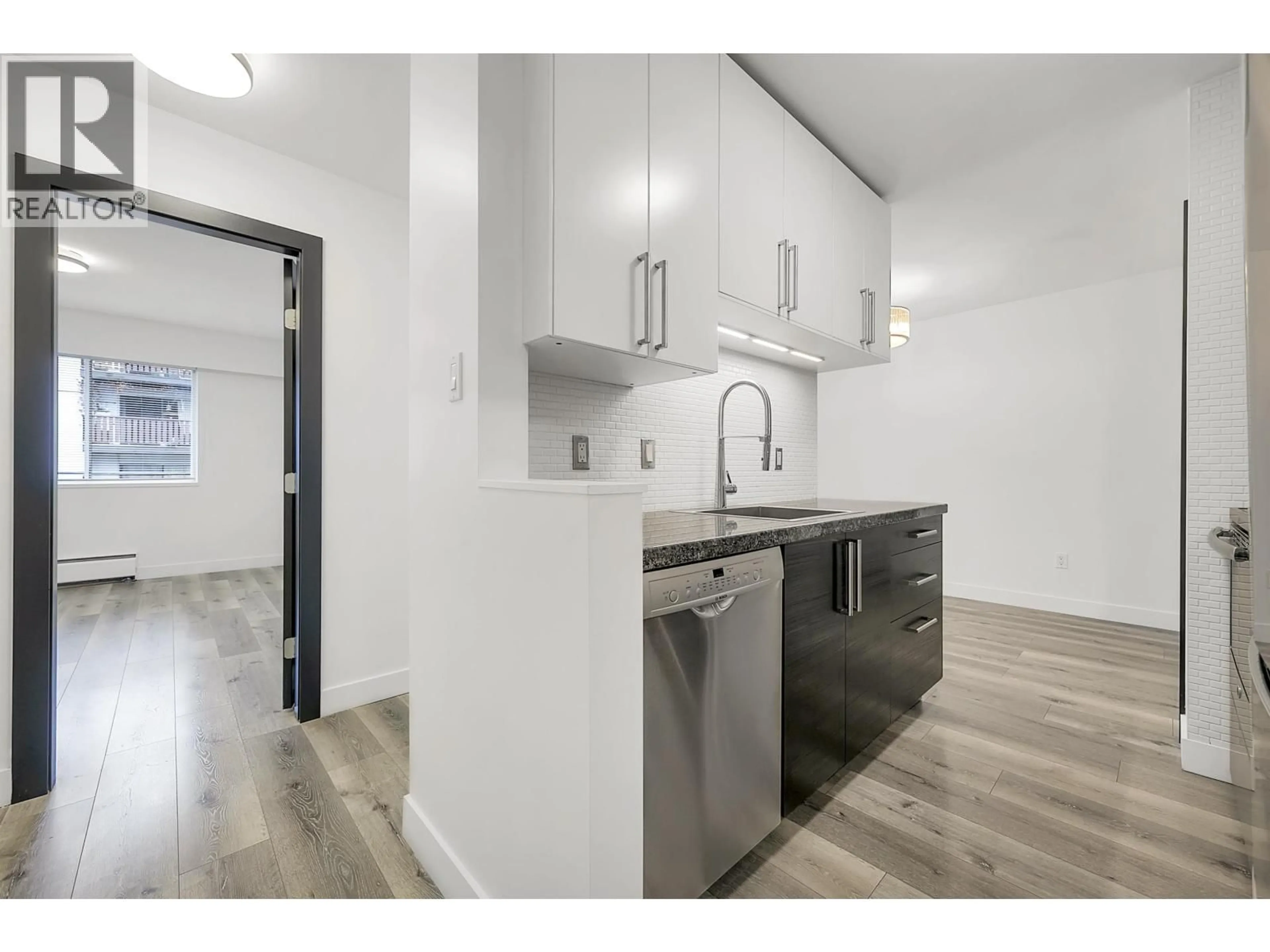 Open concept kitchen, unknown for 302 - 170 3RD STREET, North Vancouver British Columbia V7L1E6