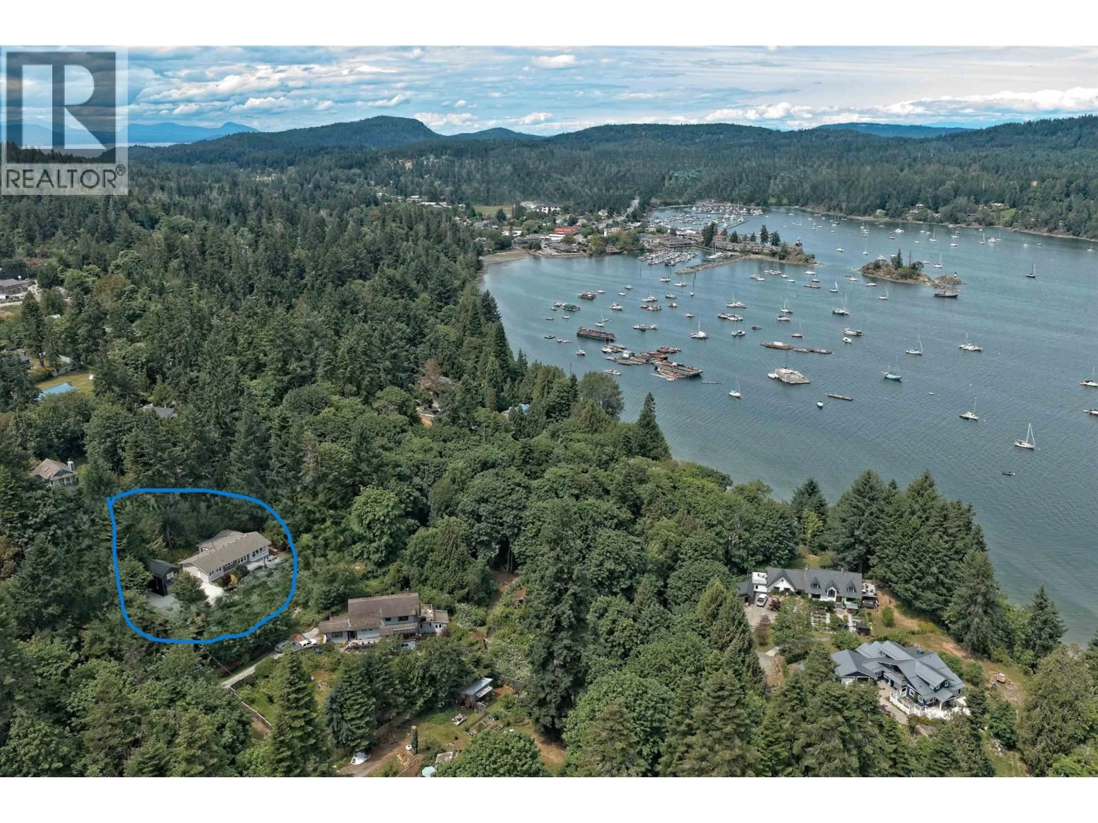A pic from outside/outdoor area/front of a property/back of a property/a pic from drone, water/lake/river/ocean view for 118 DOUGLAS ROAD, Salt Spring Island British Columbia V8K2J2