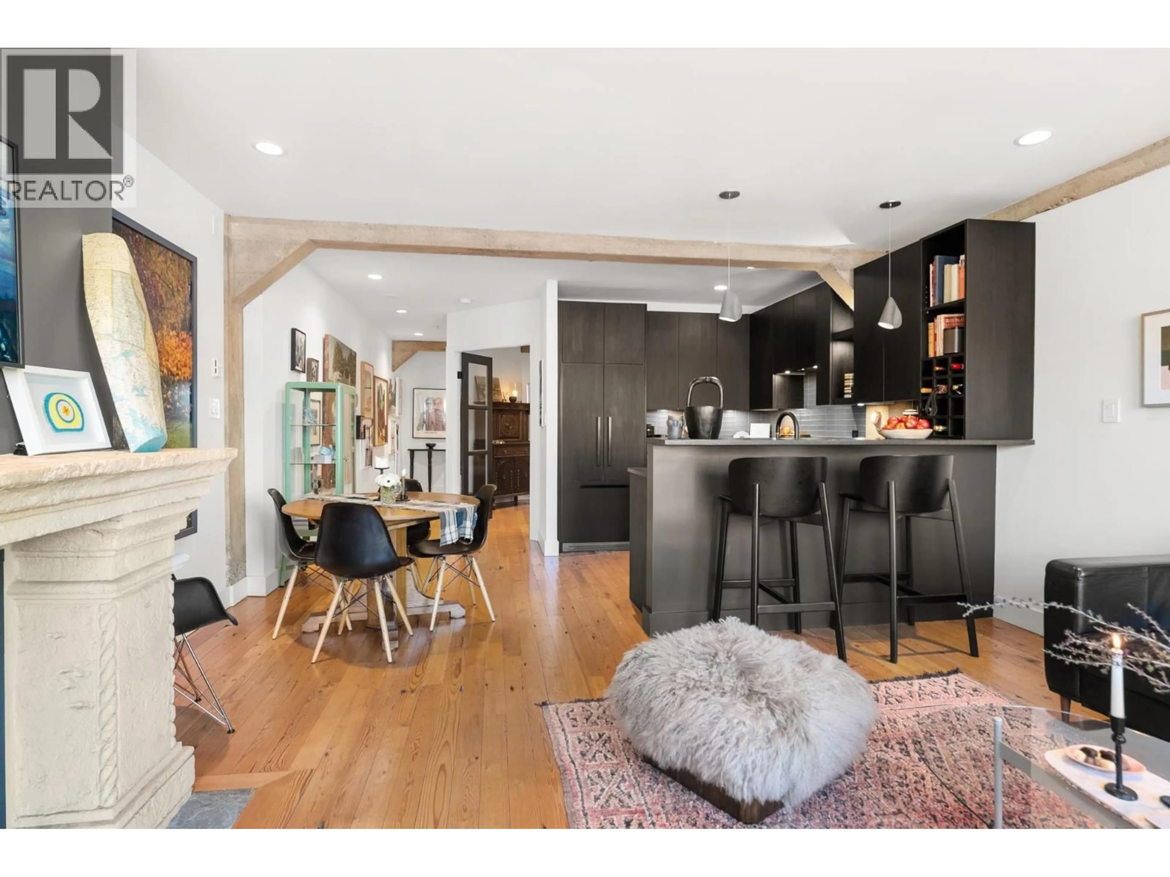 Open concept kitchen, wood/laminate floor for 407 - 1216 HOMER STREET, Vancouver British Columbia V6B6K5