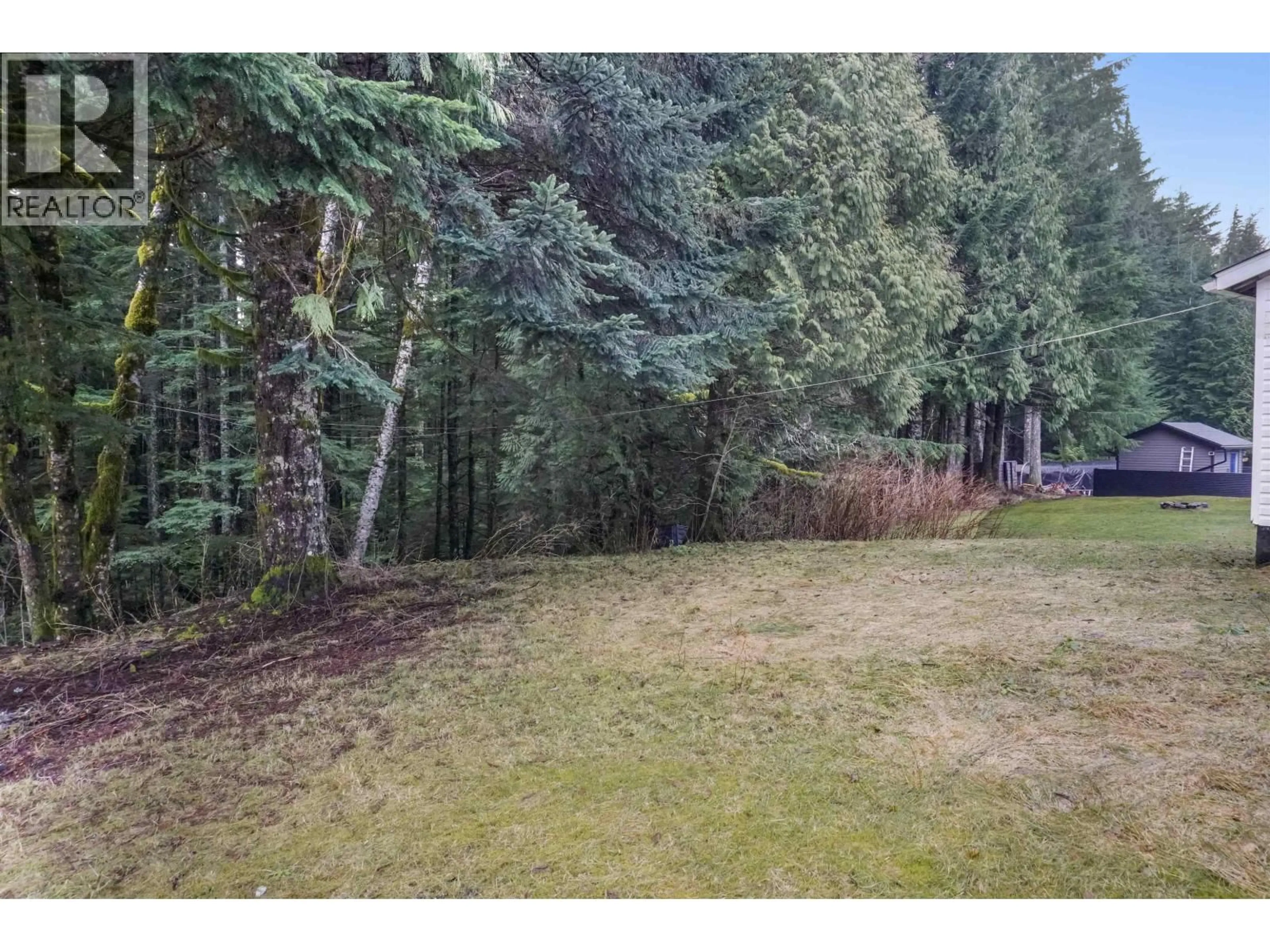 A pic from outside/outdoor area/front of a property/back of a property/a pic from drone, forest/trees view for 63 DUNN STREET, Kitimat British Columbia V8C1C6