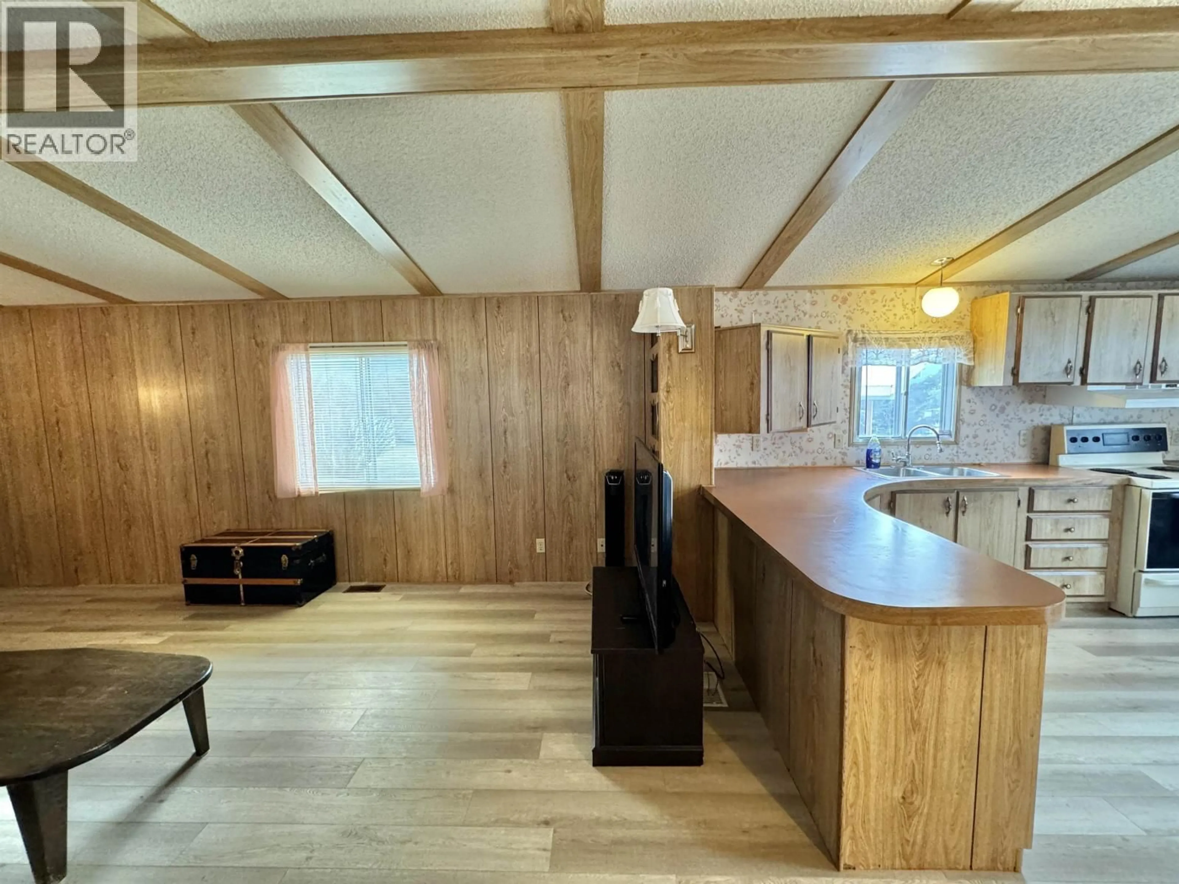 Open concept kitchen, wood/laminate floor for 54 - 770 11TH AVENUE, Williams Lake British Columbia V2G2M4