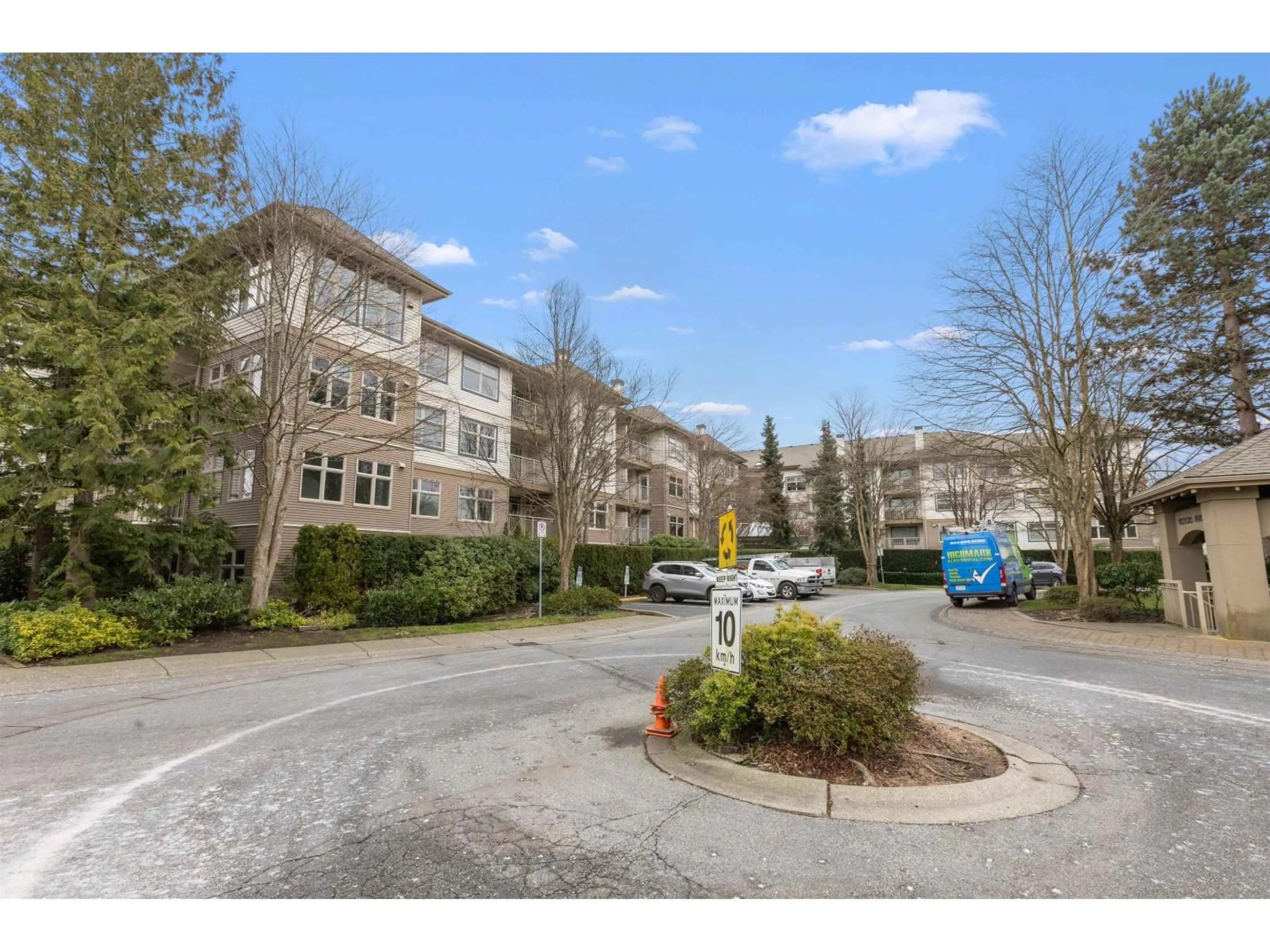 A pic from outside/outdoor area/front of a property/back of a property/a pic from drone, unknown for 411 - 15210 GUILFORD DRIVE, Surrey British Columbia V3R0X7