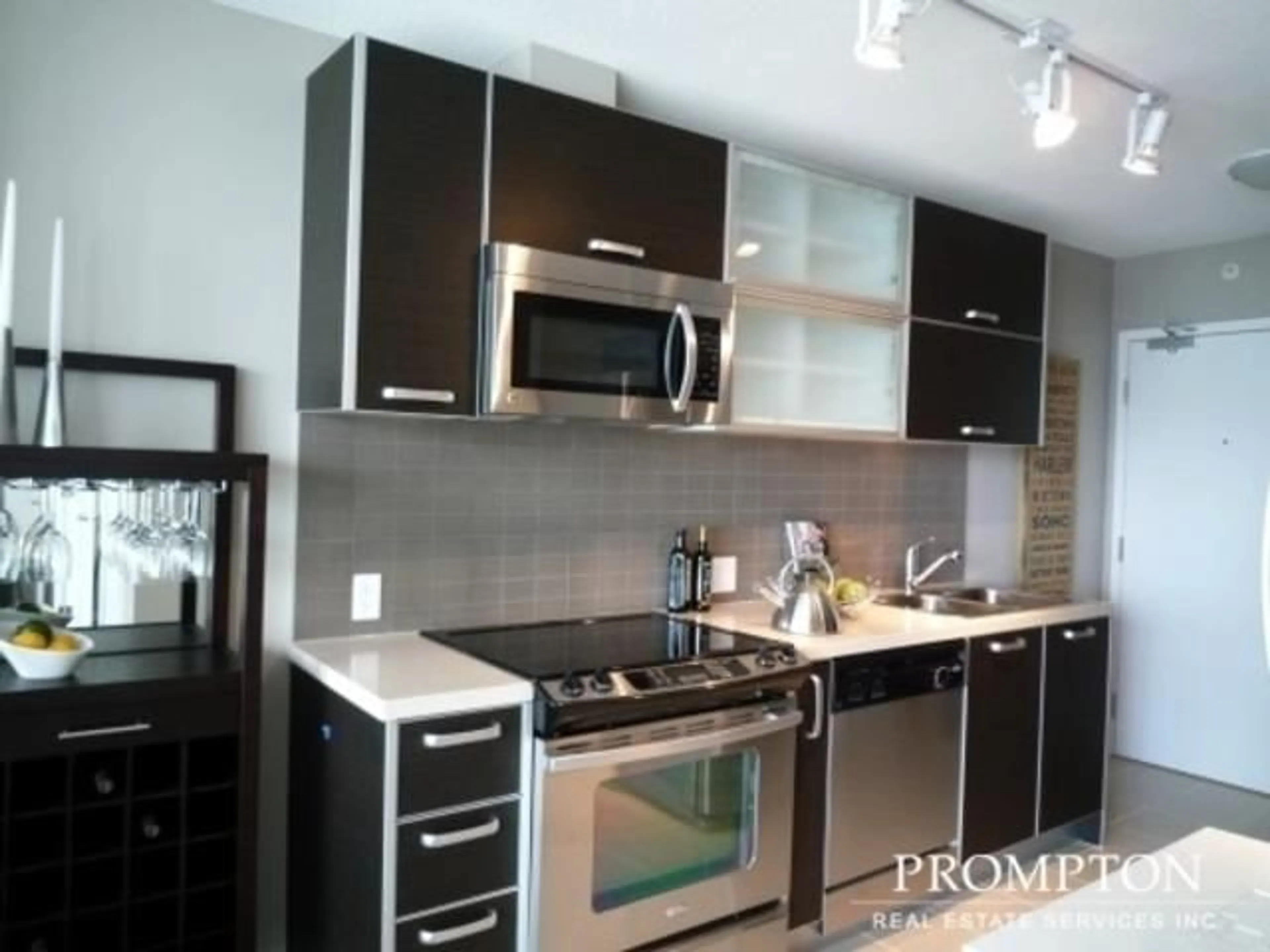 Contemporary kitchen, wood/laminate floor for 3601 - 9981 WHALLEY BOULEVARD, Surrey British Columbia V3T0G6
