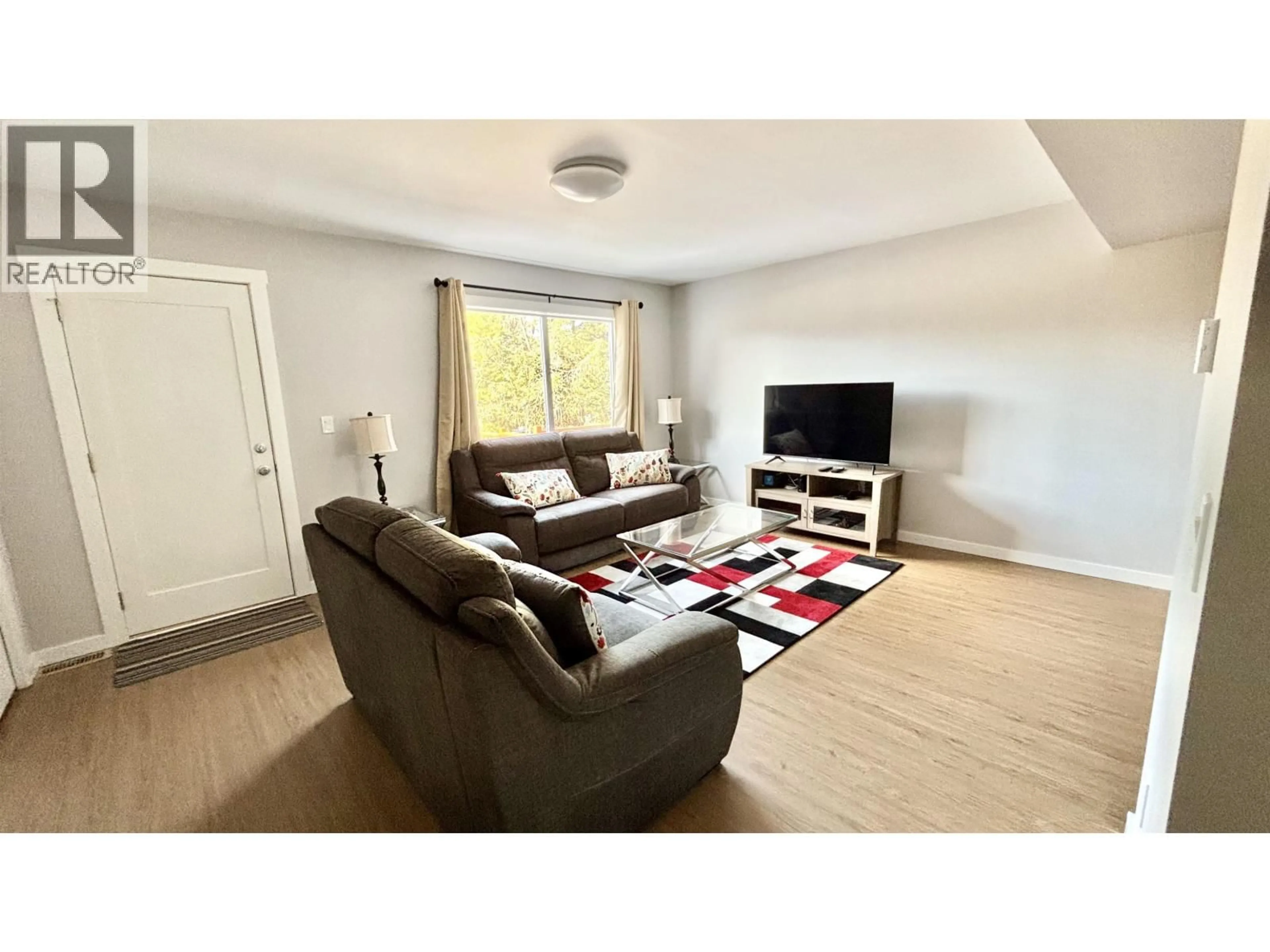 Living room with furniture, wood/laminate floor for 5 - 1425 NALABILA BOULEVARD, Kitimat British Columbia V8C1E4