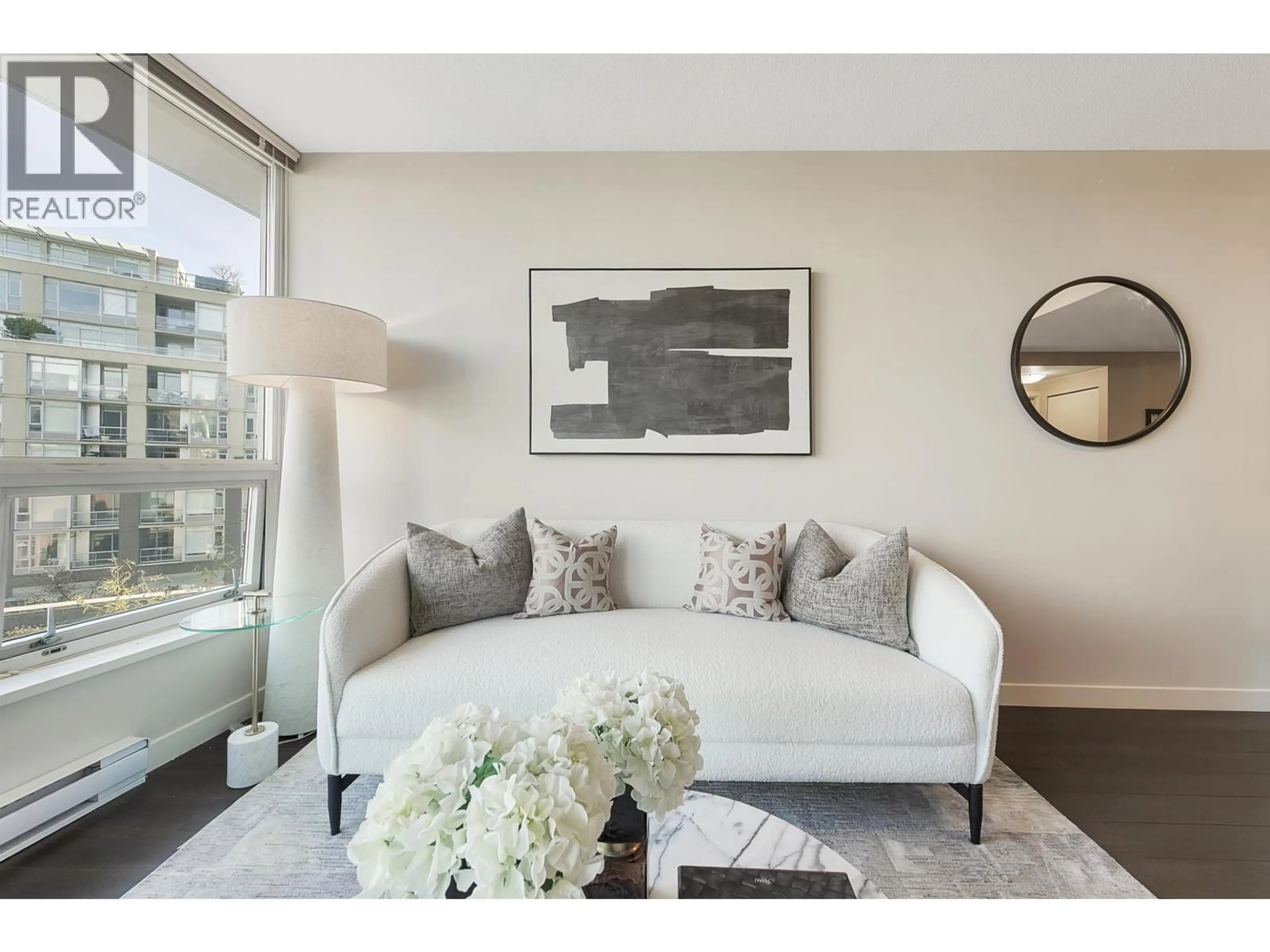 Living room with furniture, wood/laminate floor for 507 - 445 2ND AVENUE, Vancouver British Columbia V5Y0E8