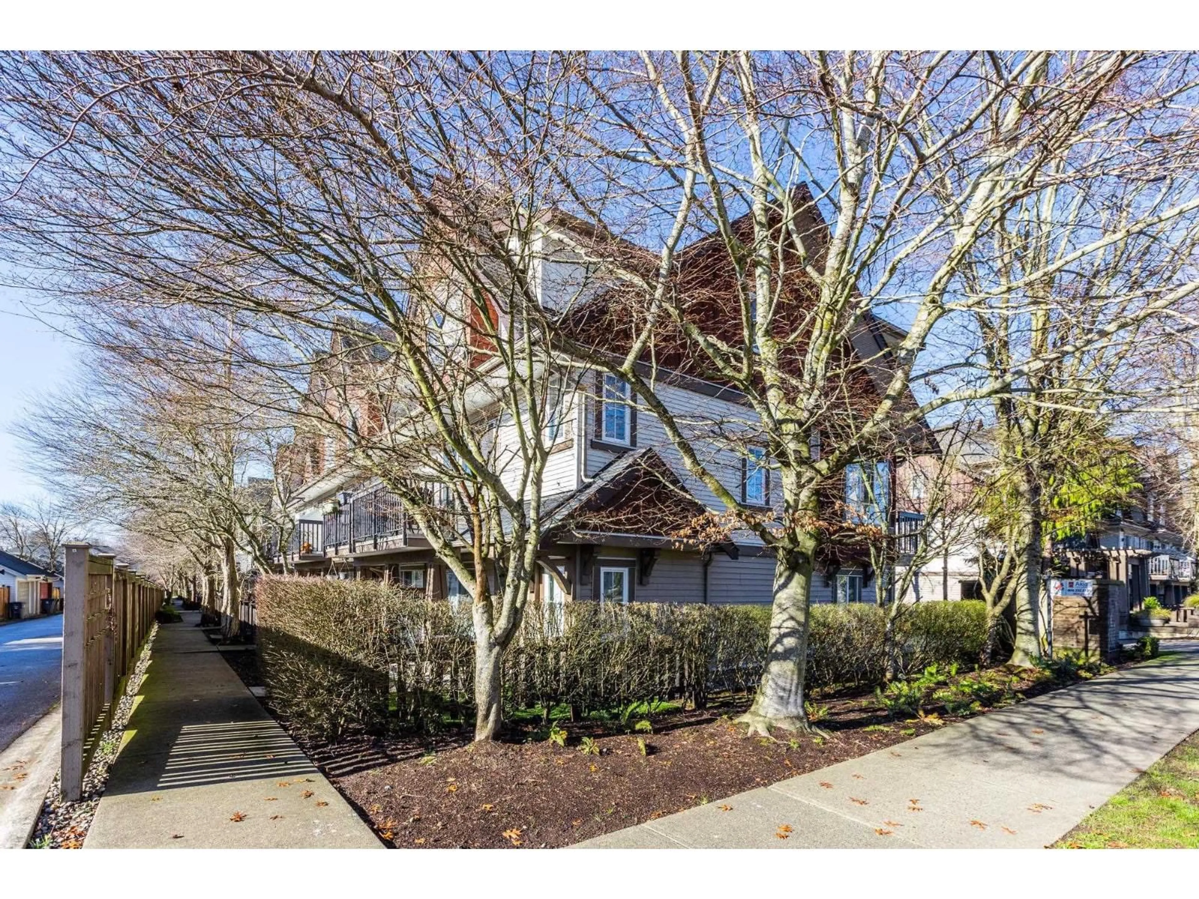 A pic from outside/outdoor area/front of a property/back of a property/a pic from drone, street for 23 - 7155 189 STREET, Surrey British Columbia V4N5S8