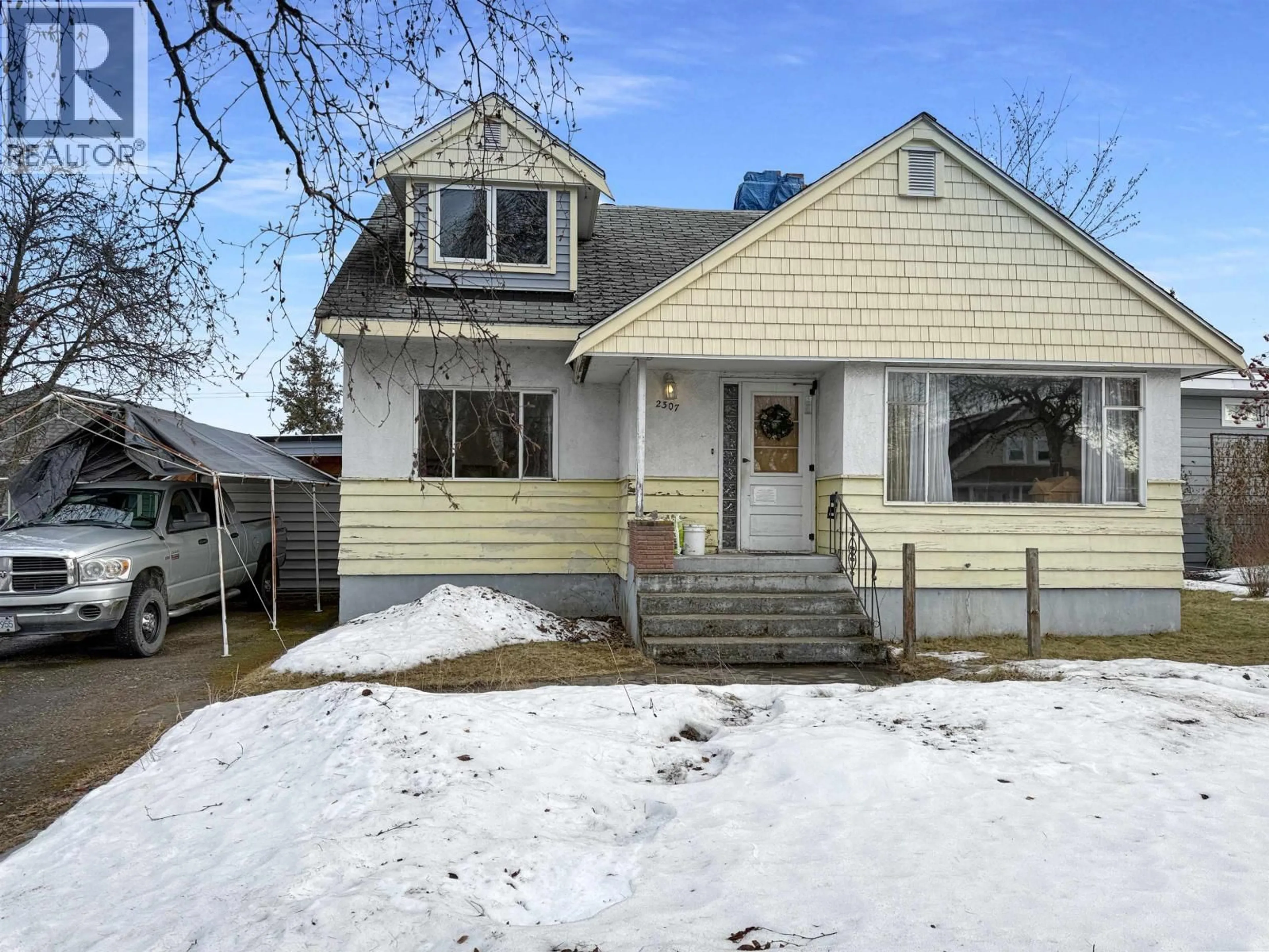 Home with vinyl exterior material, street for 2307 MCBRIDE CRESCENT, Prince George British Columbia V2M1Z8