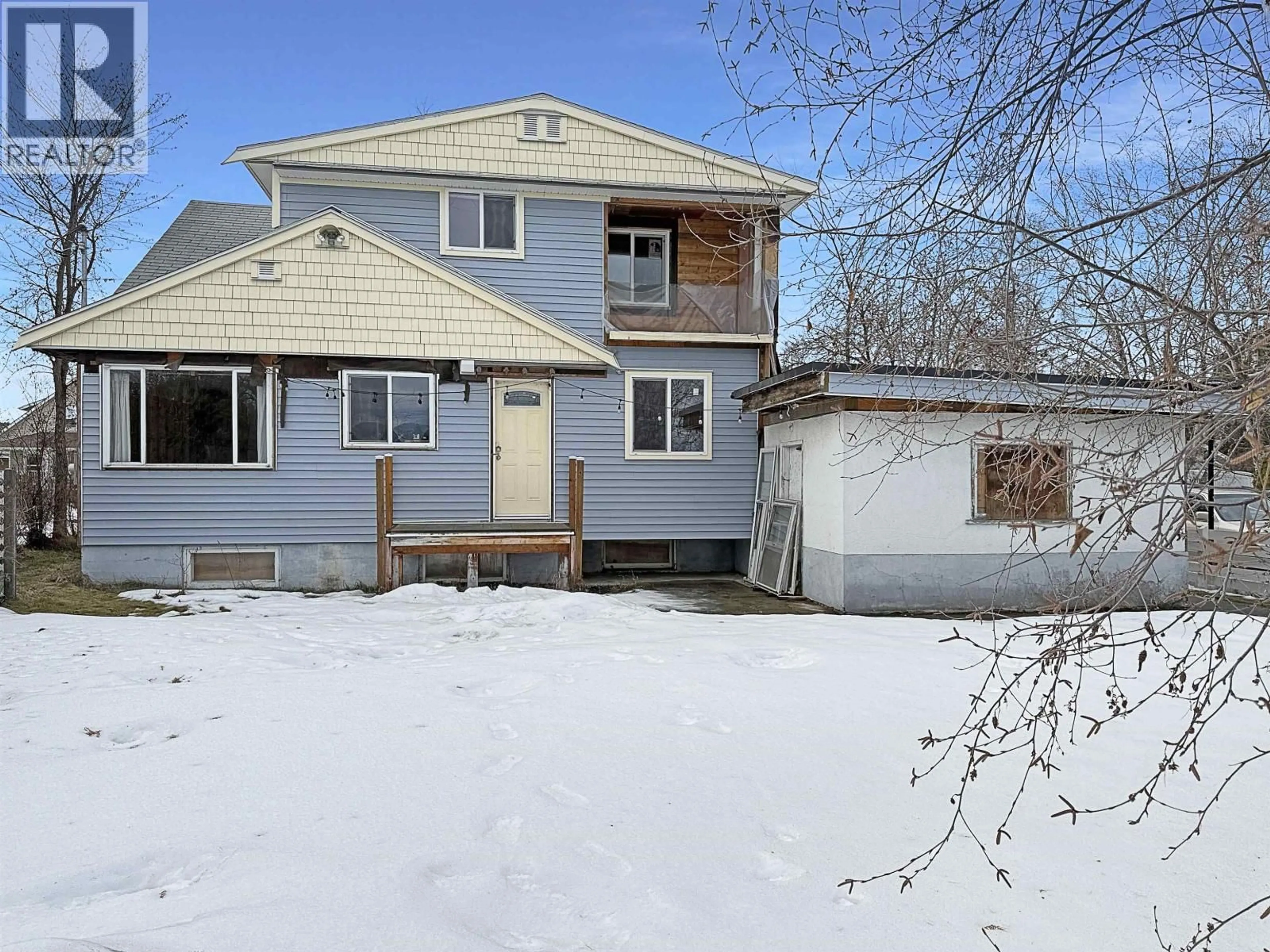 Home with vinyl exterior material, street for 2307 MCBRIDE CRESCENT, Prince George British Columbia V2M1Z8