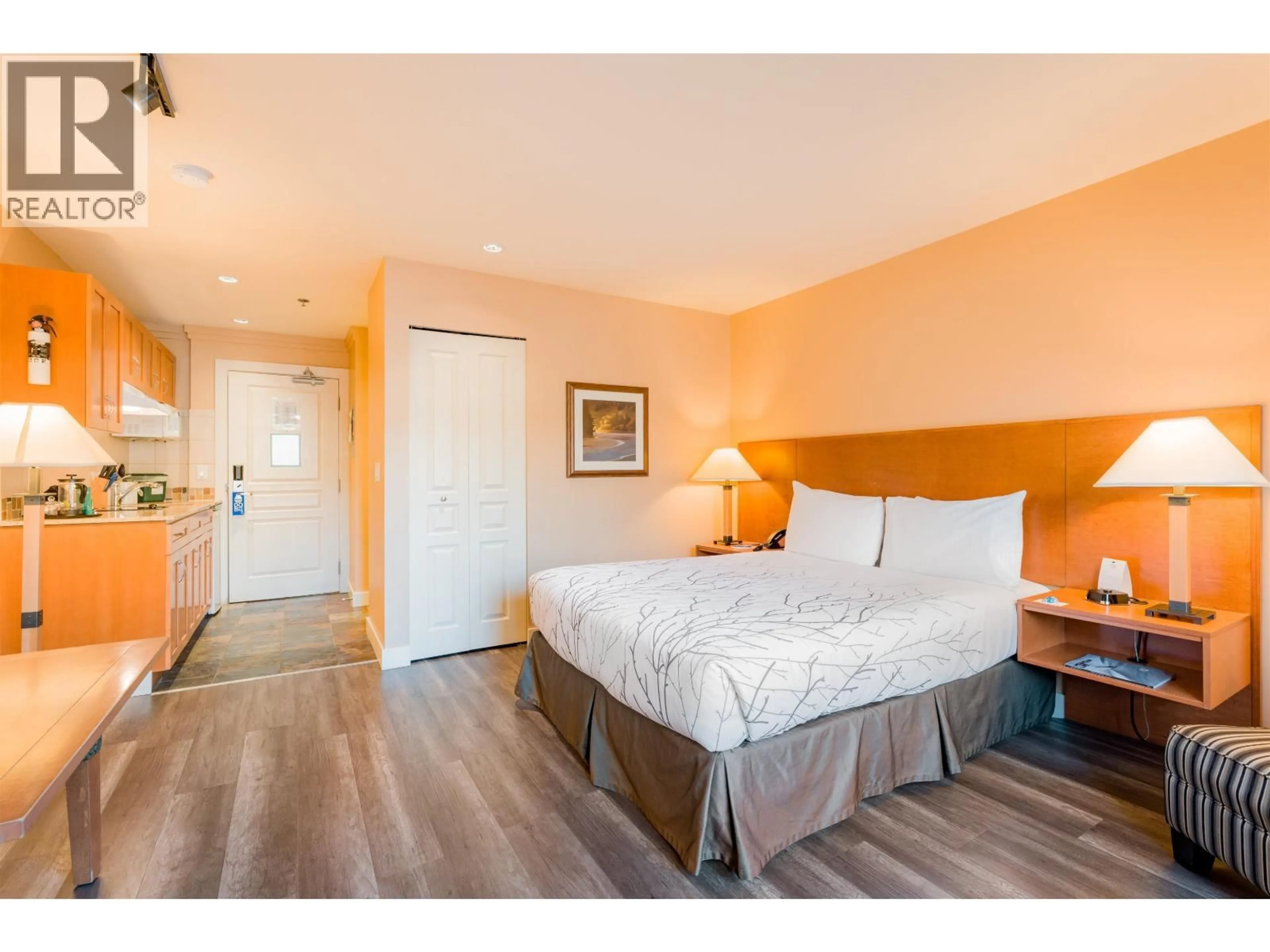 Bedroom with bed, wood/laminate floor for 101 - 1490 HIGHWAY 99, Pemberton British Columbia V0N2L1