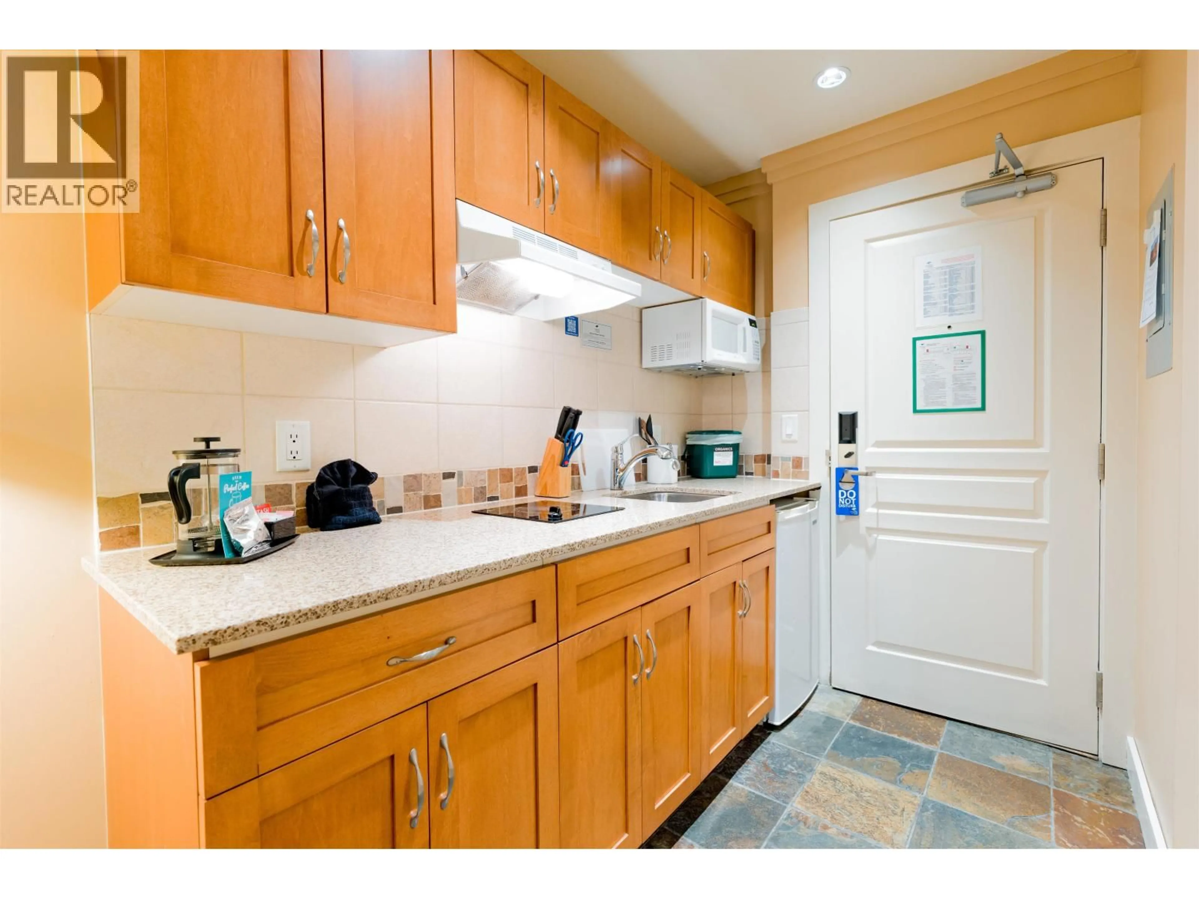 Standard kitchen, ceramic/tile floor for 101 - 1490 HIGHWAY 99, Pemberton British Columbia V0N2L1