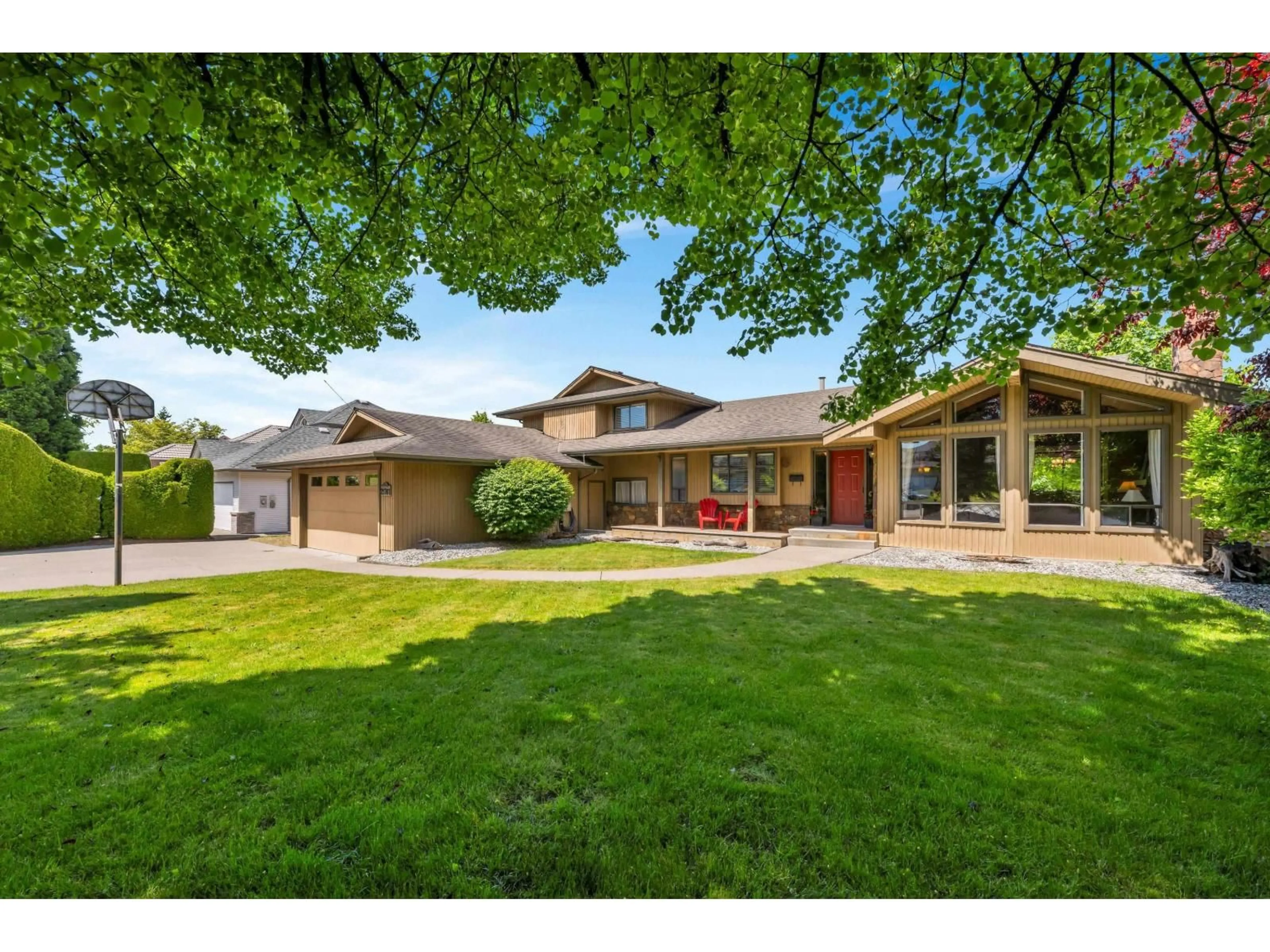 A pic from outside/outdoor area/front of a property/back of a property/a pic from drone, street for 21761 49A AVENUE, Langley British Columbia V3A6C4