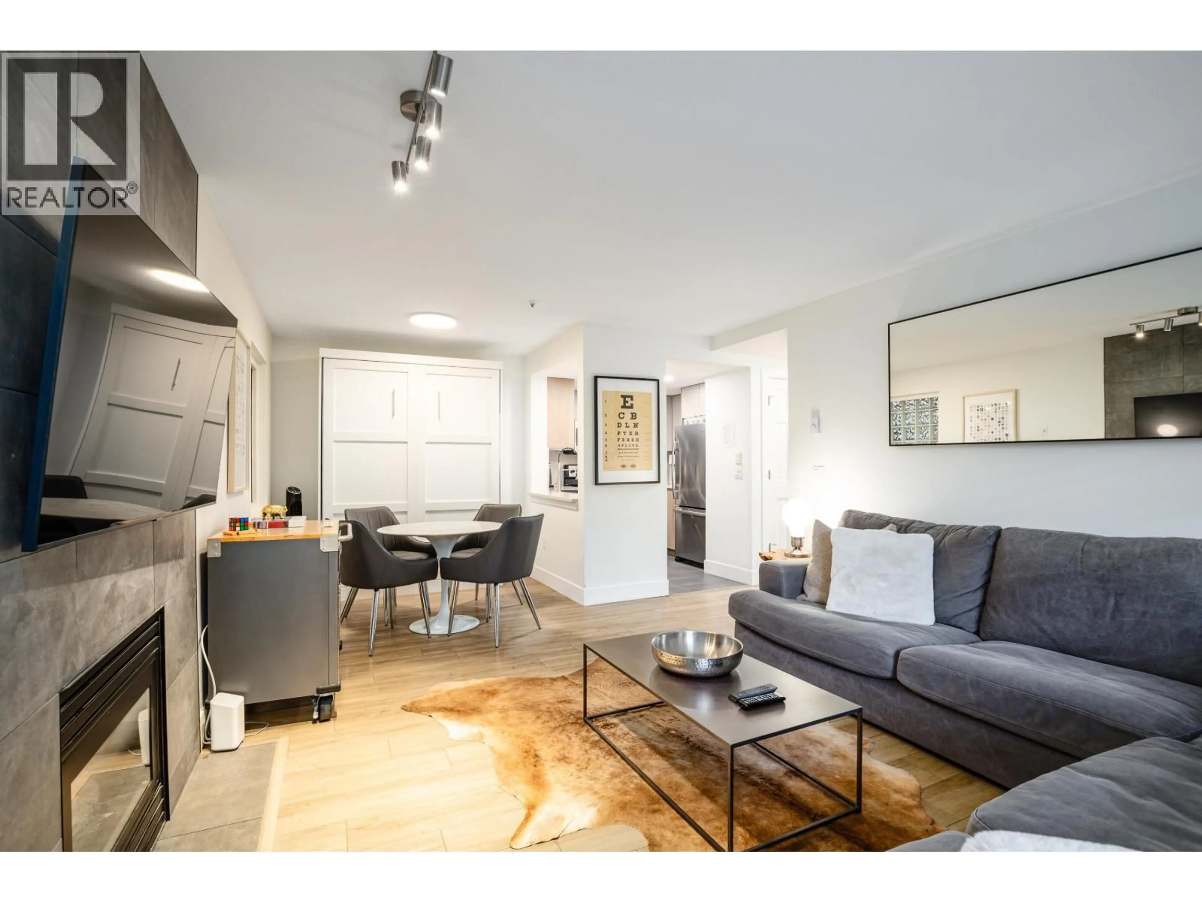 Living room with furniture, wood/laminate floor for 80 - 4355 NORTHLANDS BOULEVARD, Whistler British Columbia V8E1C3