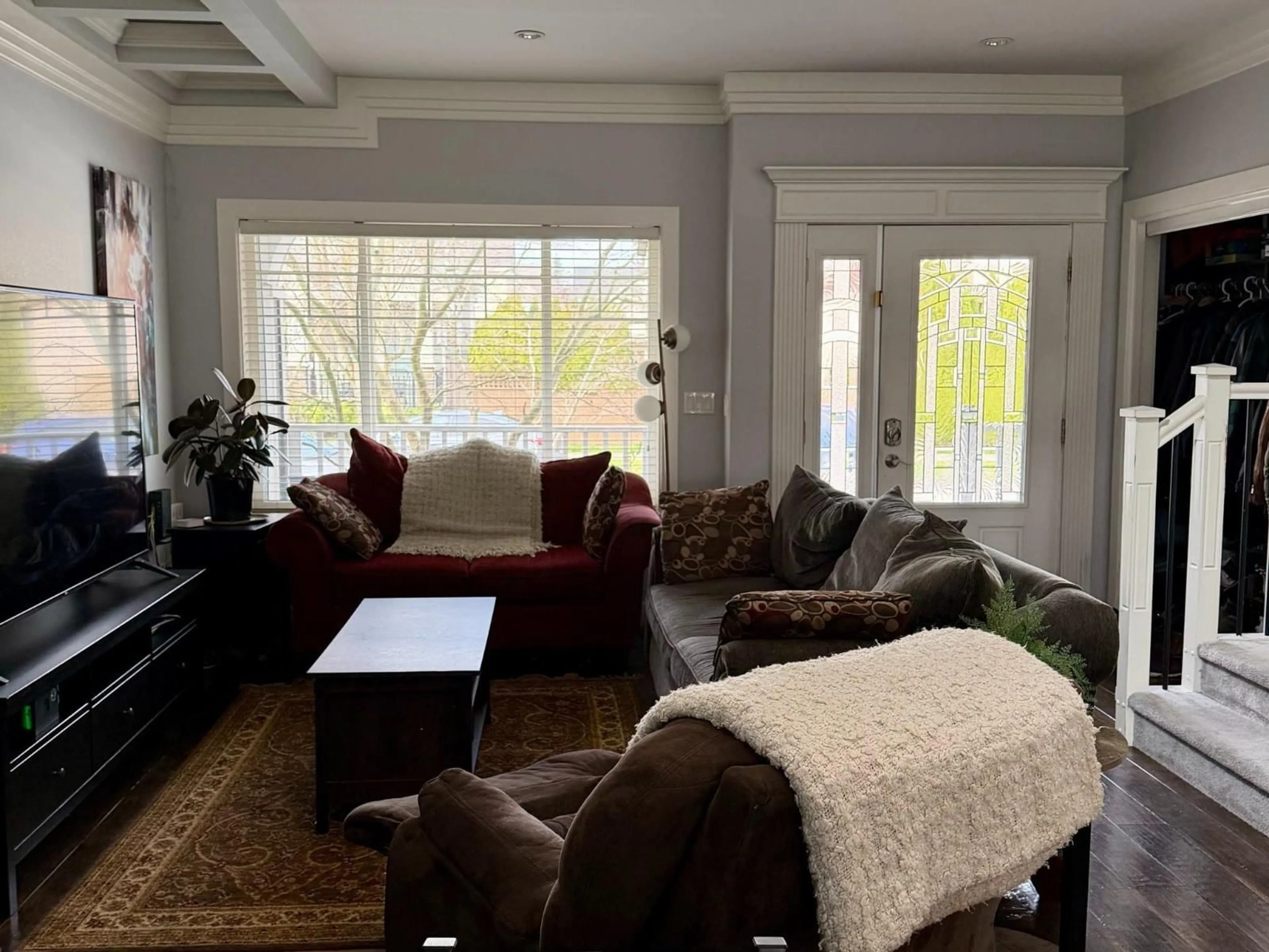 Living room with furniture, wood/laminate floor for 342 173A STREET, Surrey British Columbia V3Z2N7