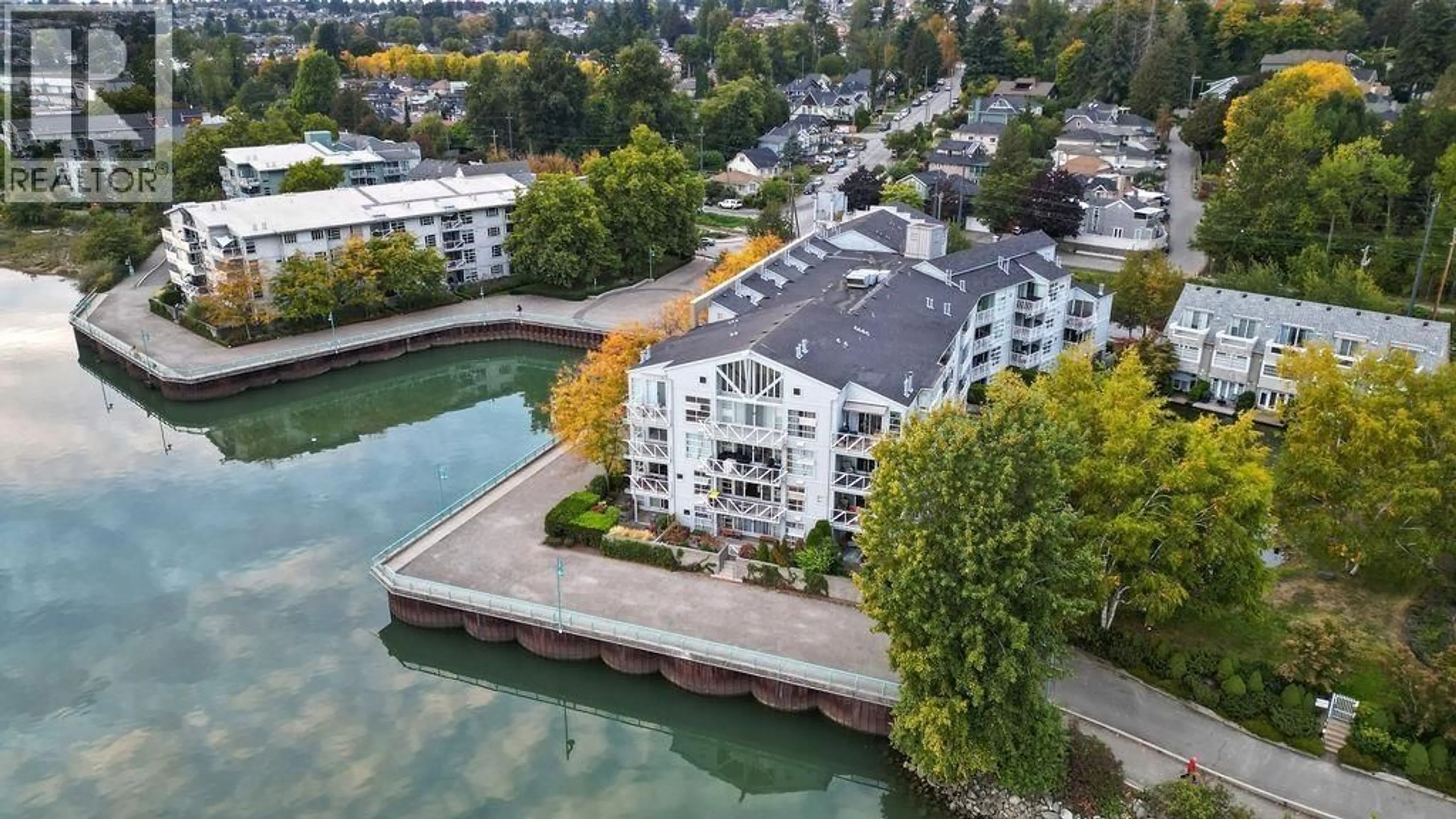 A pic from outside/outdoor area/front of a property/back of a property/a pic from drone, water/lake/river/ocean view for 315 - 2020 KENT AVENUE SOUTH, Vancouver British Columbia V5P4X1