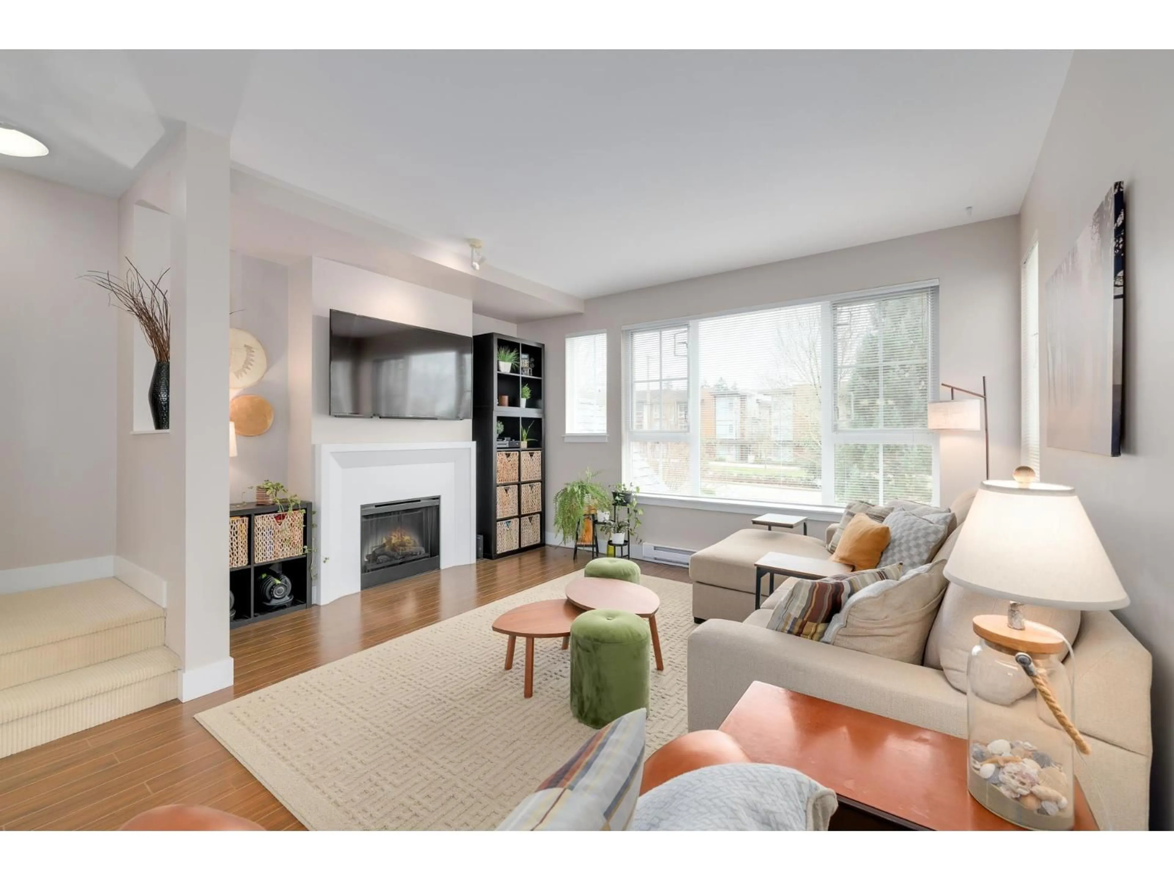 Living room with furniture, wood/laminate floor for 58 - 2450 161A STREET, Surrey British Columbia V3Z8K4