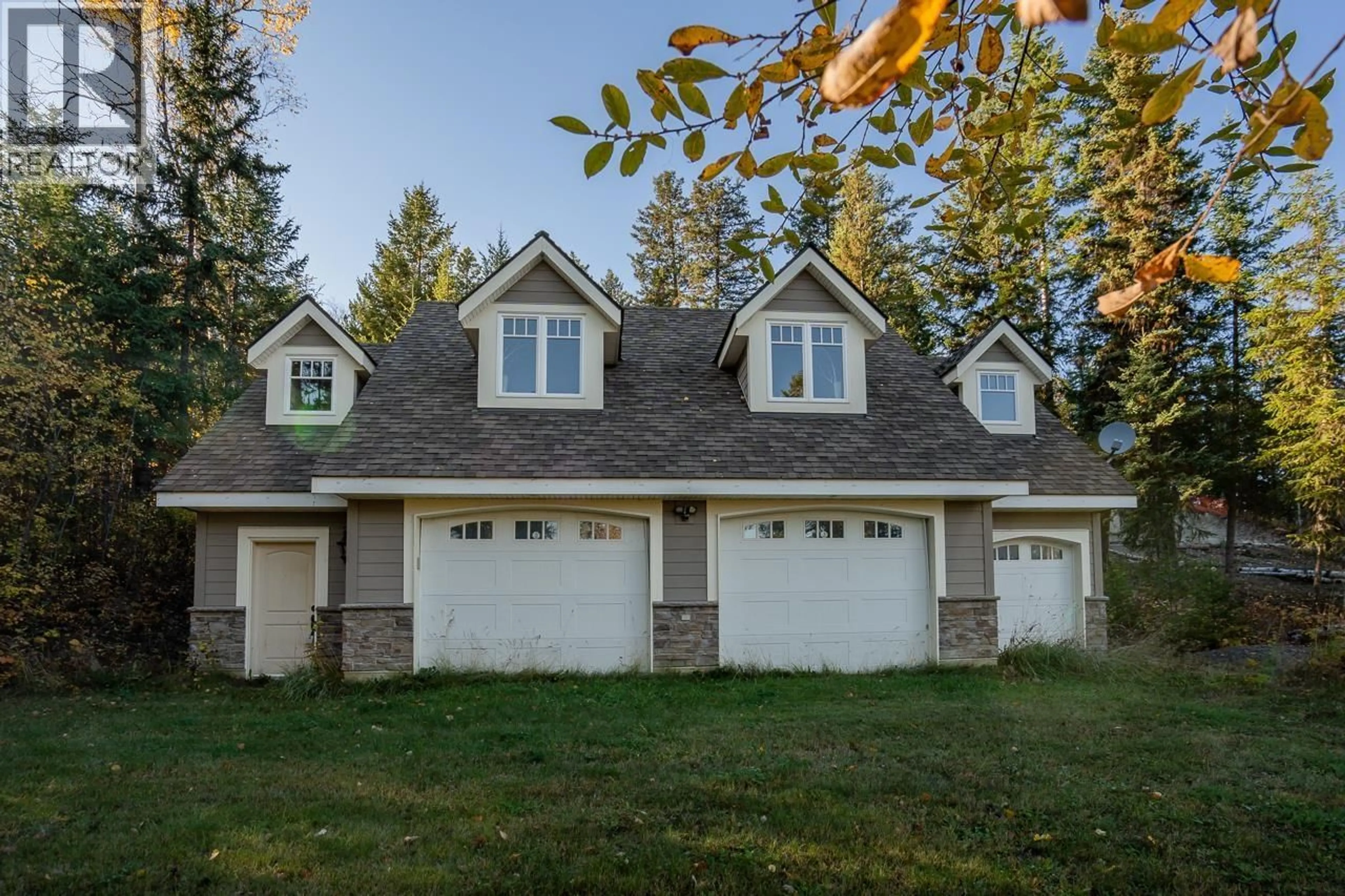 Home with vinyl exterior material, street for 7460 RUFFELL ROAD, Canim Lake British Columbia V0K1J0