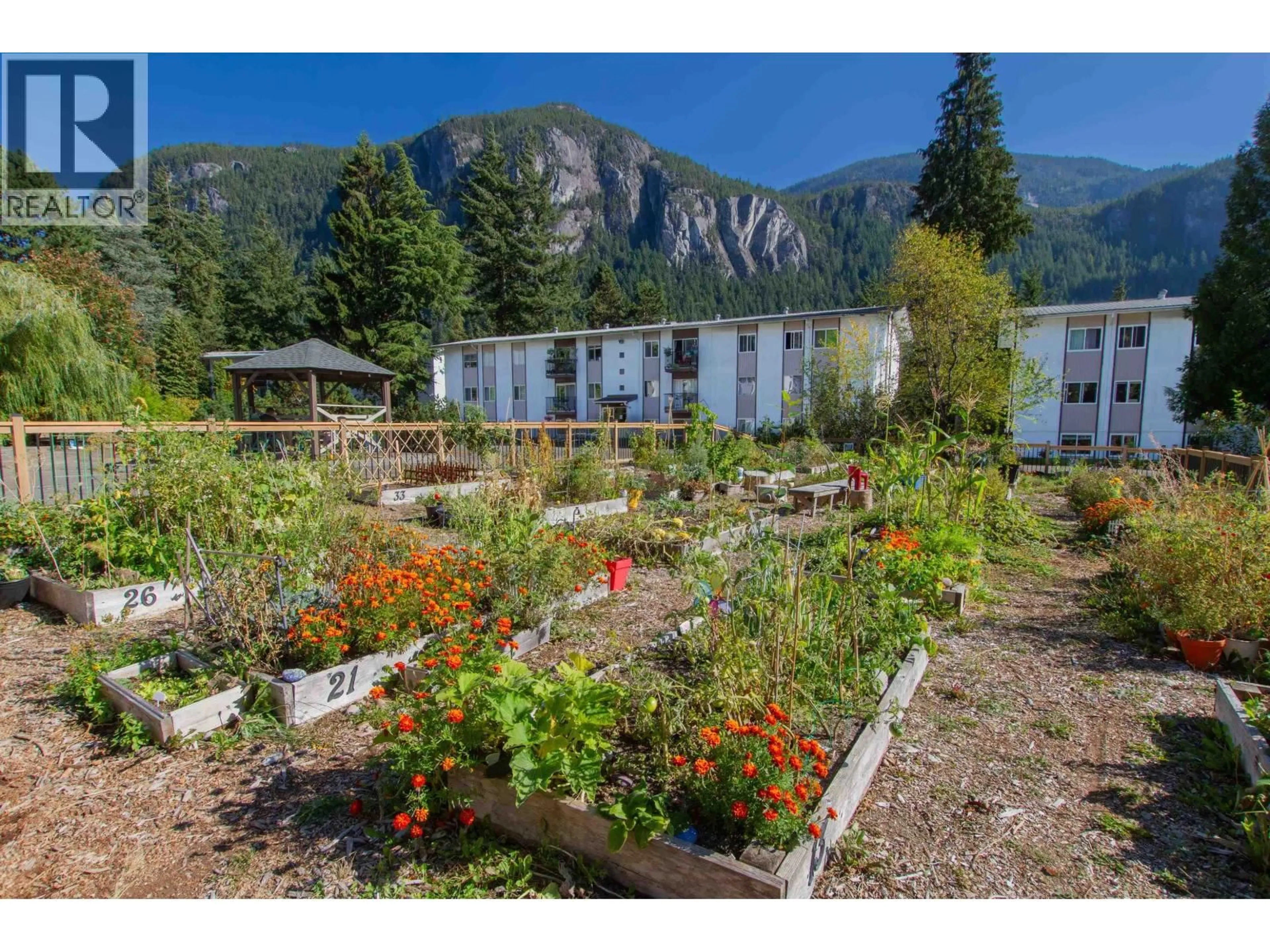 A pic from outside/outdoor area/front of a property/back of a property/a pic from drone, mountain view for 25 - 38175 WESTWAY AVENUE, Squamish British Columbia V8B0Y4