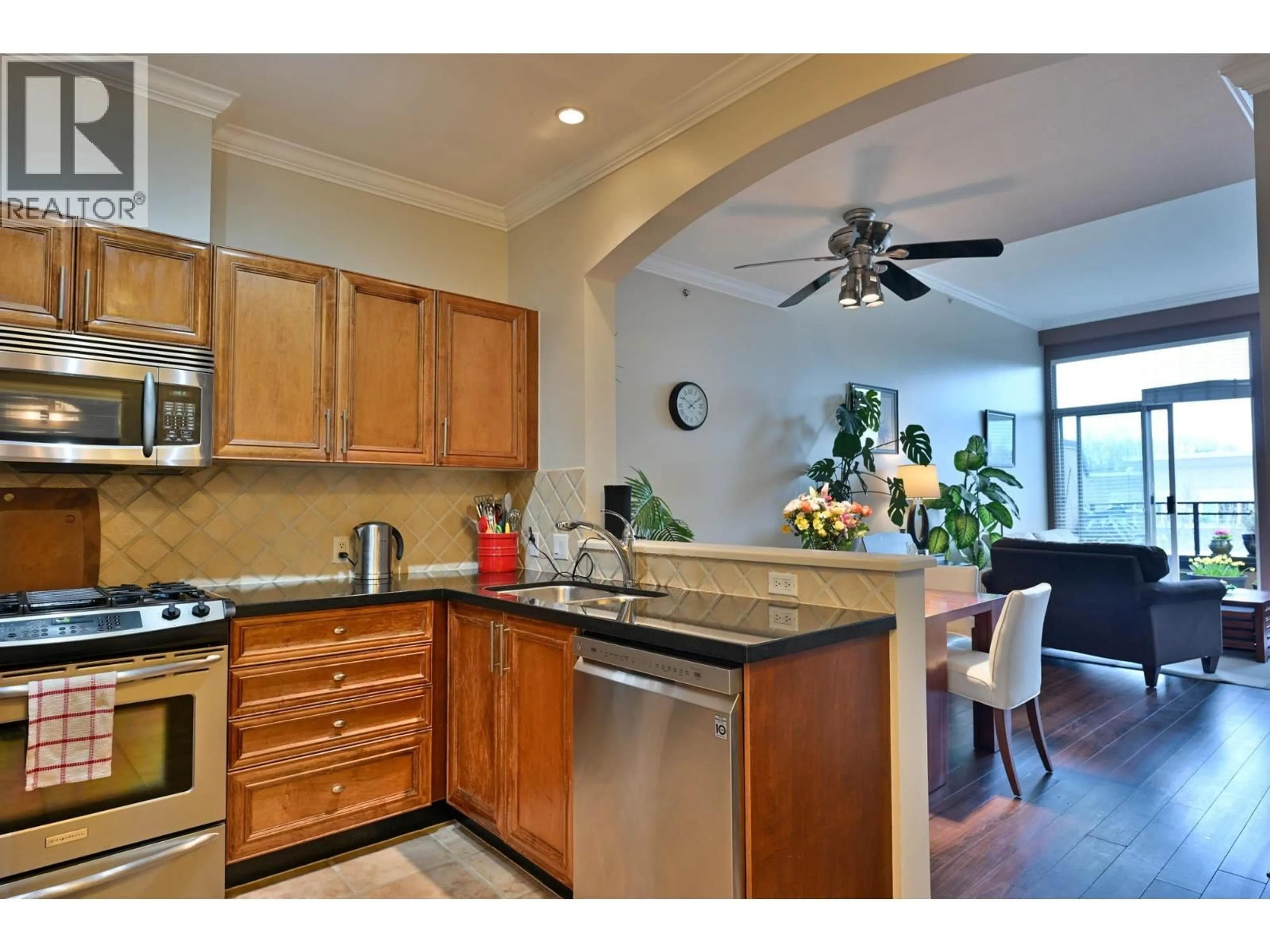 Open concept kitchen, ceramic/tile floor for 407 - 2175 SALAL DRIVE, Vancouver British Columbia V6K4V2