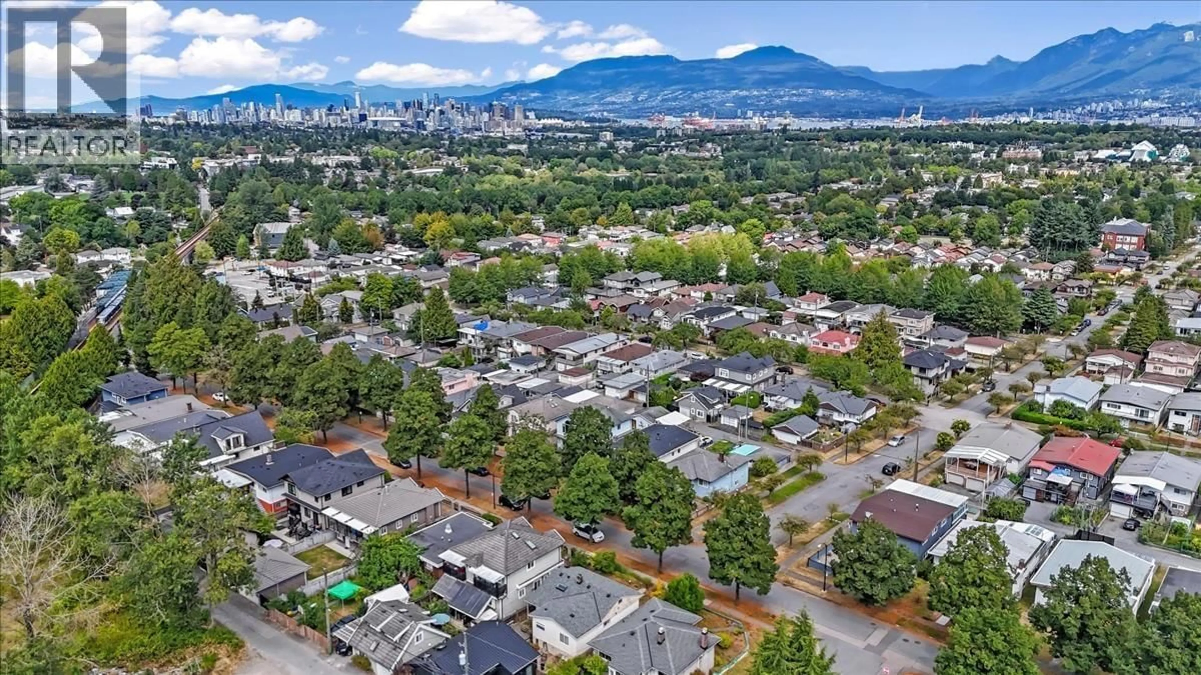 A pic from outside/outdoor area/front of a property/back of a property/a pic from drone, mountain view for 2593 25TH AVENUE, Vancouver British Columbia V5R1H2
