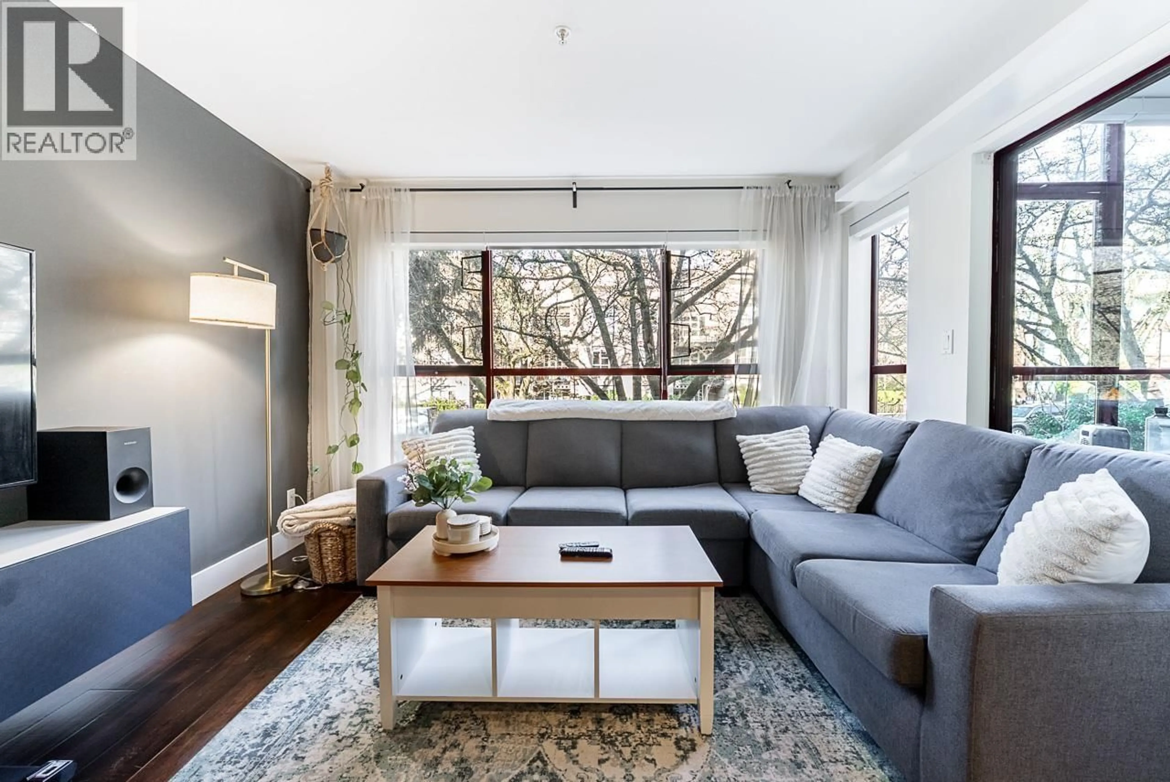 Living room with furniture, wood/laminate floor for 203 - 2140 W 12TH STREET, Vancouver British Columbia V6K2N2