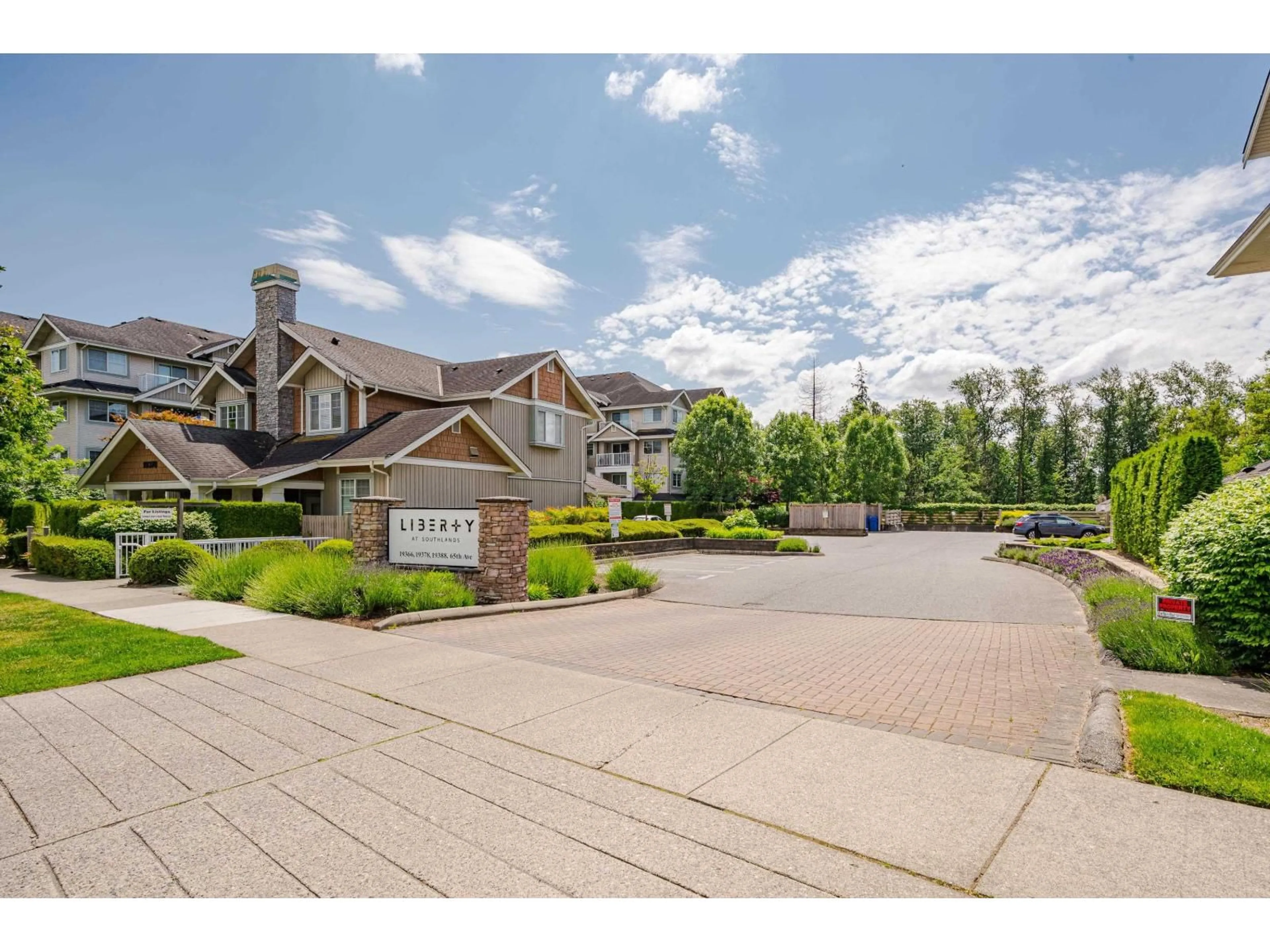 A pic from outside/outdoor area/front of a property/back of a property/a pic from drone, mountain view for 309 - 19366 65 AVENUE, Surrey British Columbia V4N5S1
