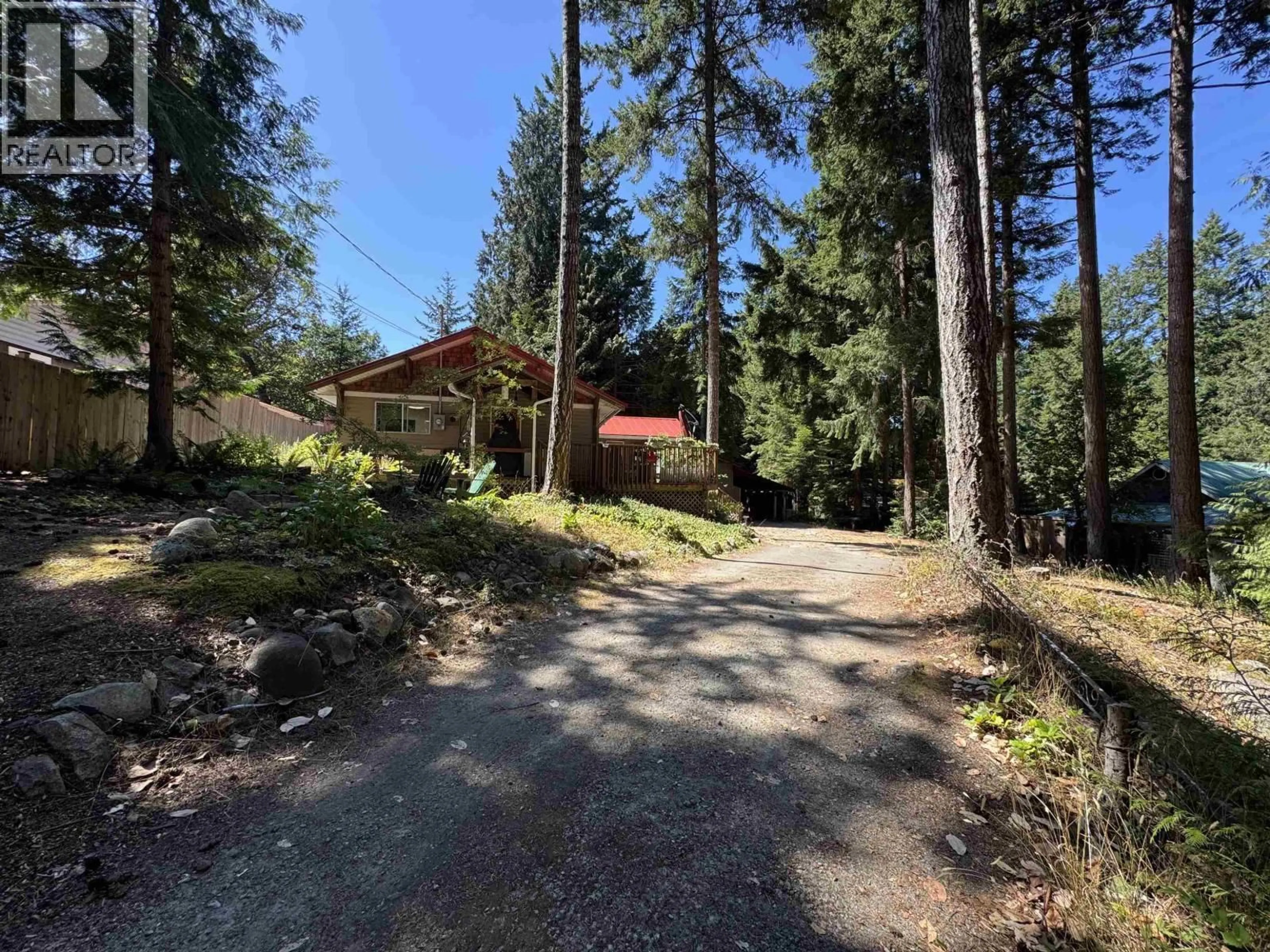 A pic from outside/outdoor area/front of a property/back of a property/a pic from drone, forest/trees view for 559 BLITZ ROAD, Mayne Island British Columbia V0N2J1
