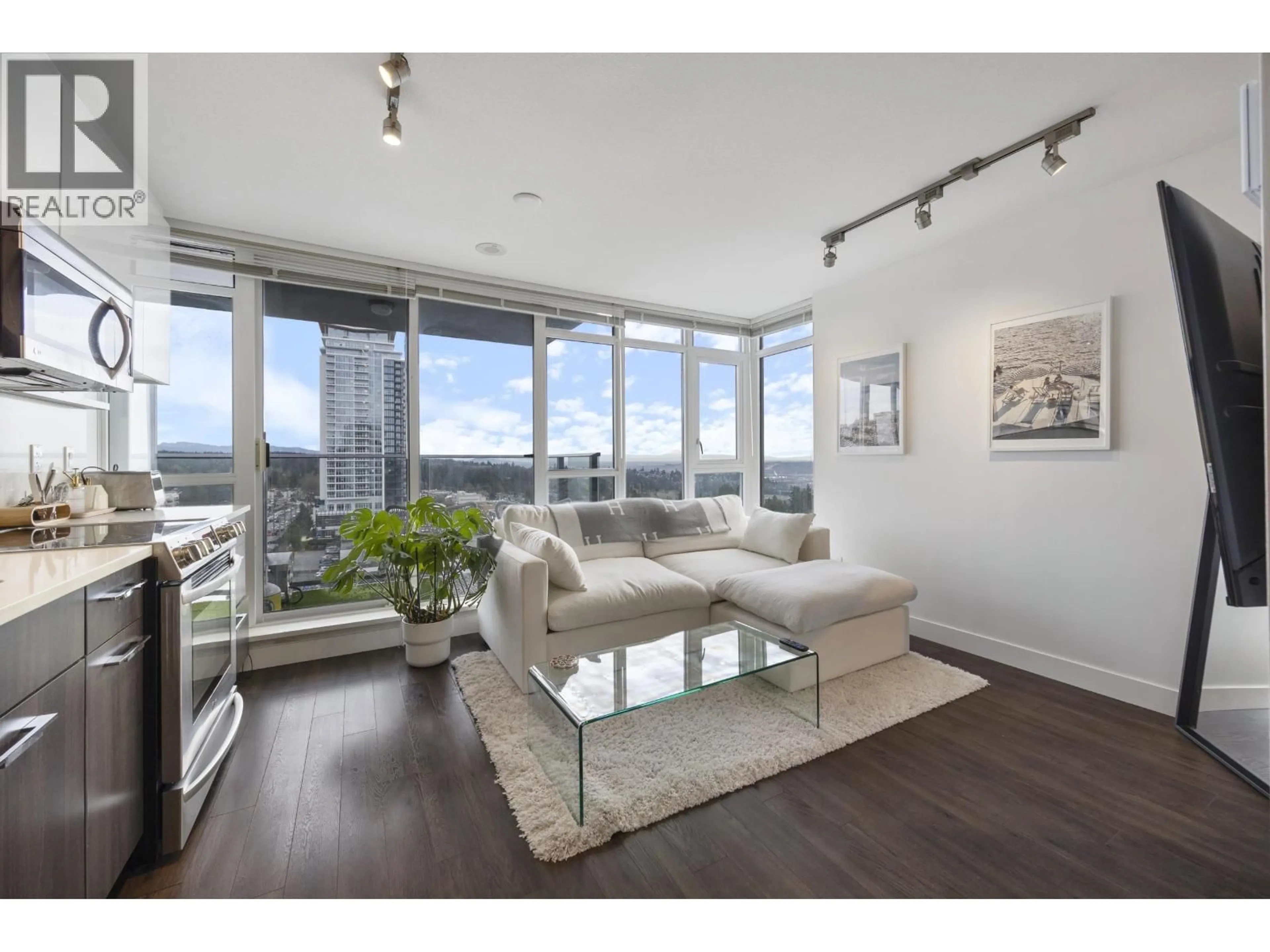 Living room with furniture, wood/laminate floor for 1208 - 958 RIDGEWAY AVENUE, Coquitlam British Columbia V3K0C5