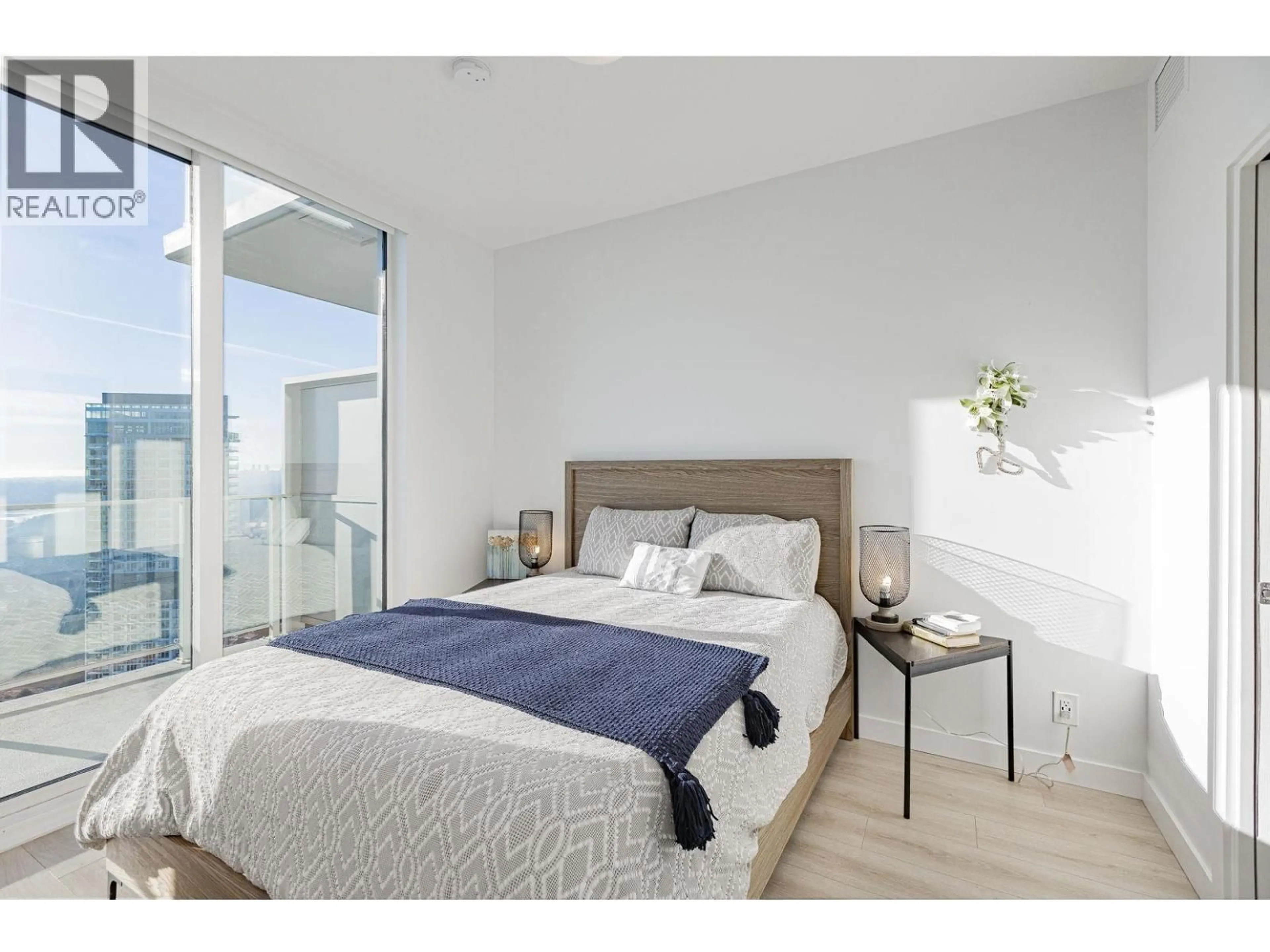 Bedroom with bed, wood/laminate floor for 3907 - 567 CLARKE ROAD, Coquitlam British Columbia V3J0K7