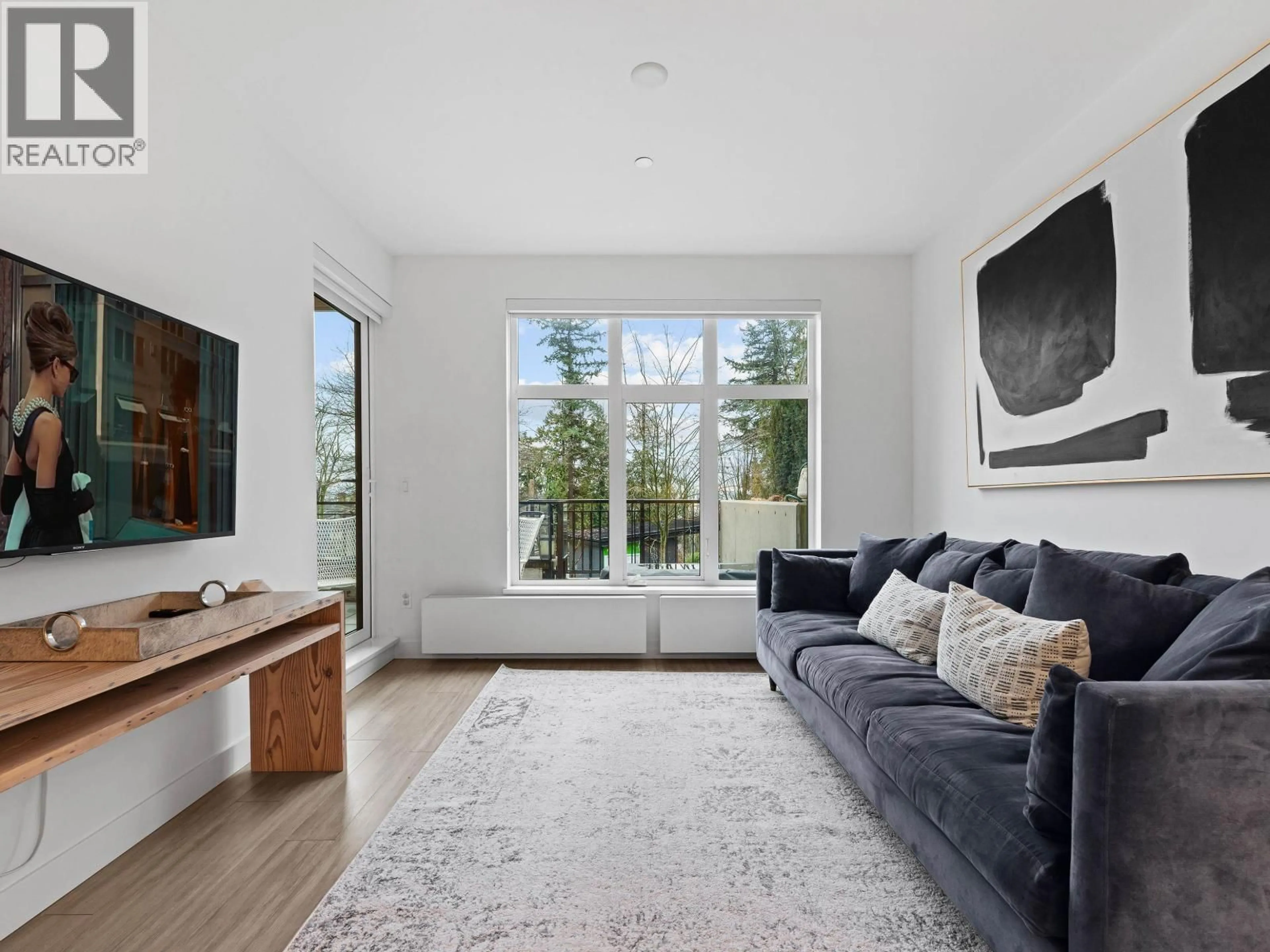 Living room with furniture, unknown for 107 - 733 3RD STREET, North Vancouver British Columbia V7L1G8