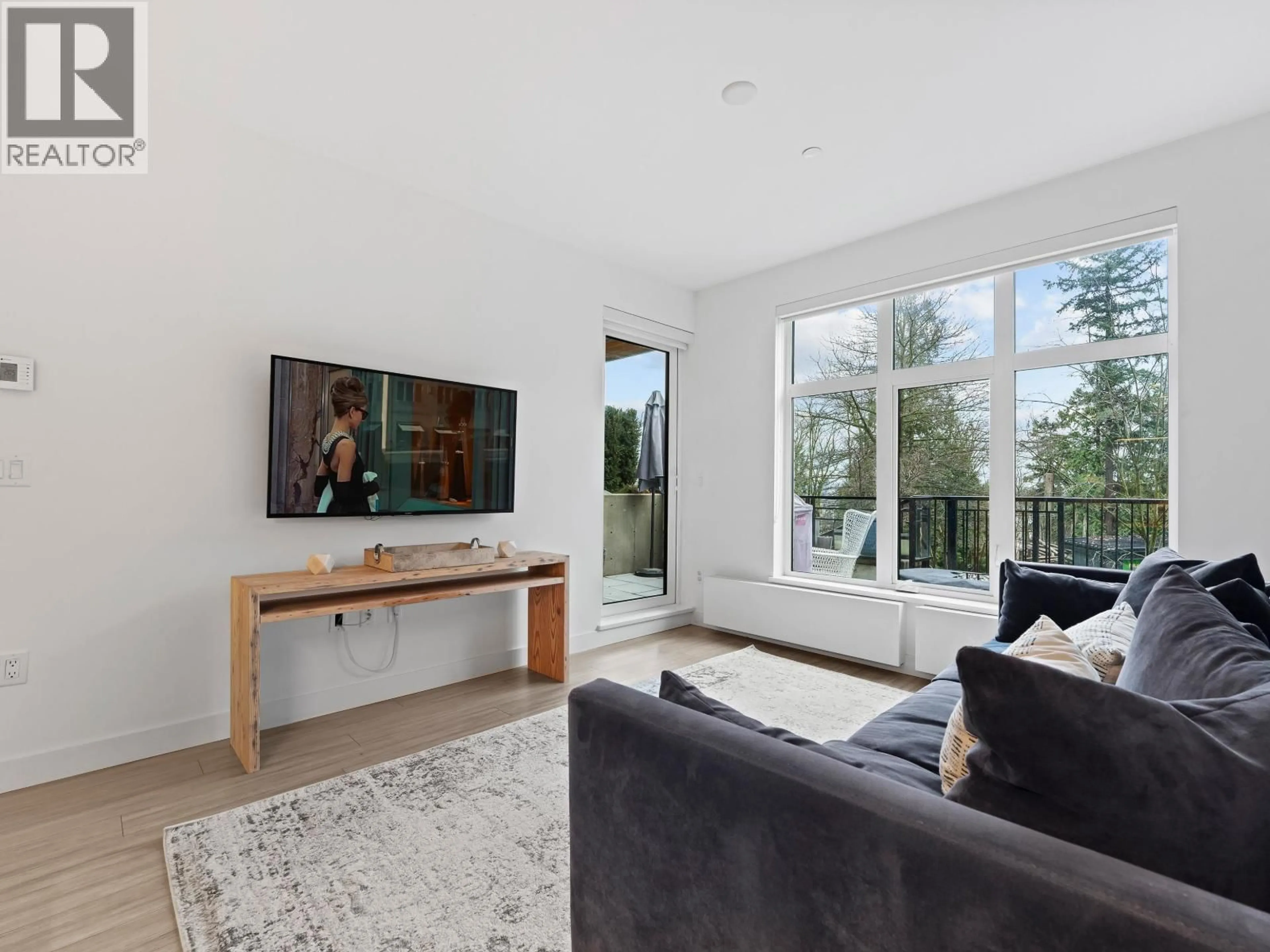 Living room with furniture, unknown for 107 - 733 3RD STREET, North Vancouver British Columbia V7L1G8