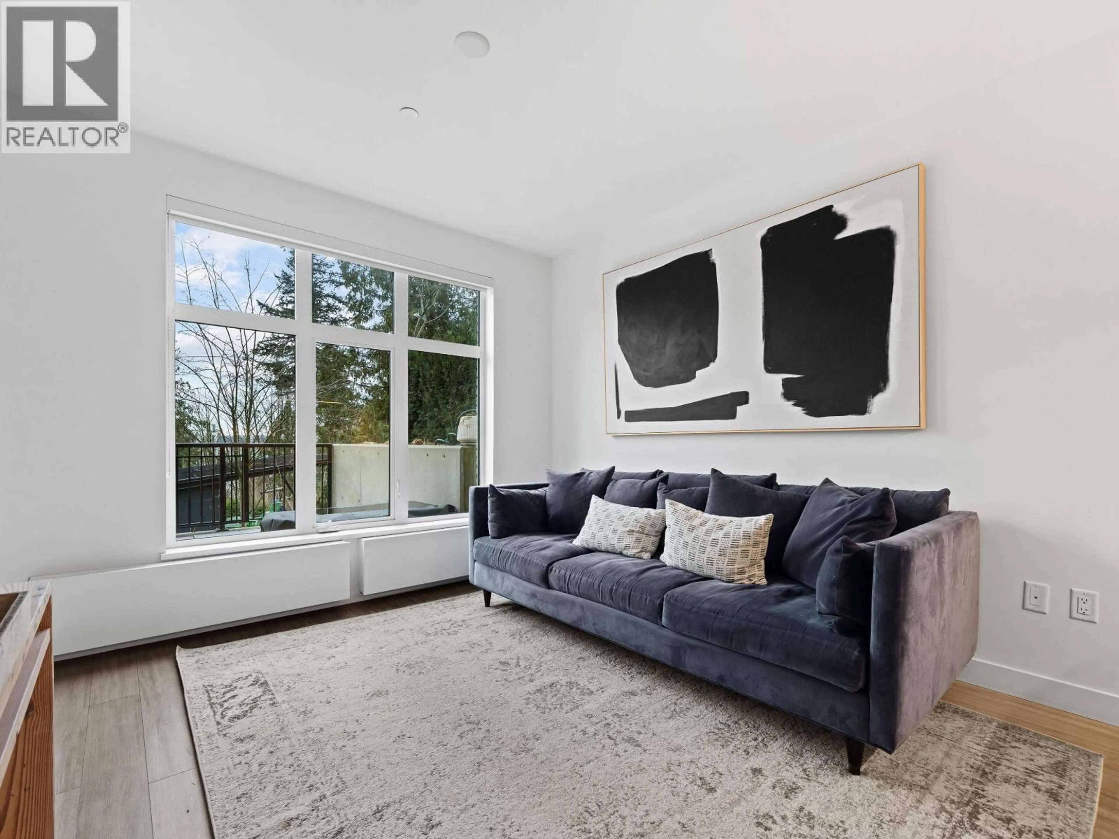 Living room with furniture, unknown for 107 - 733 3RD STREET, North Vancouver British Columbia V7L1G8