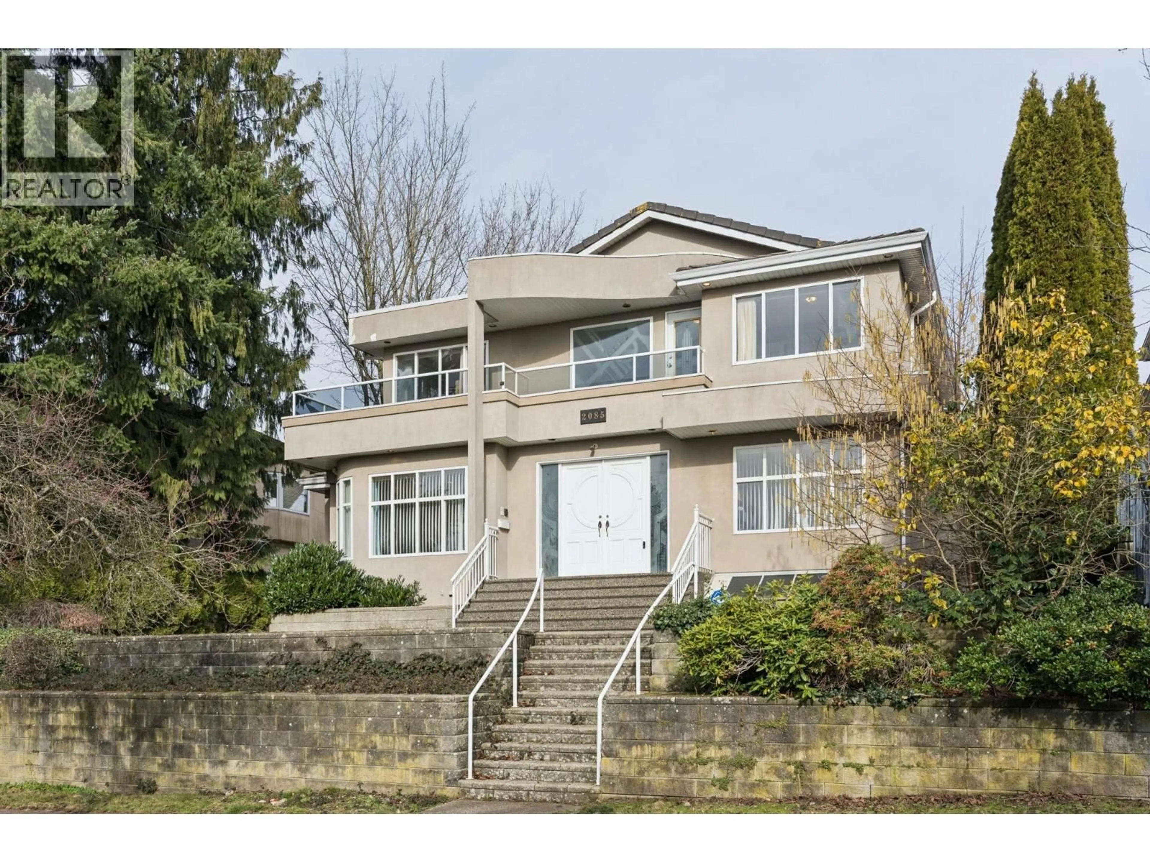 Home with brick exterior material, street for 2085 QUALICUM DRIVE, Vancouver British Columbia V5P2M3