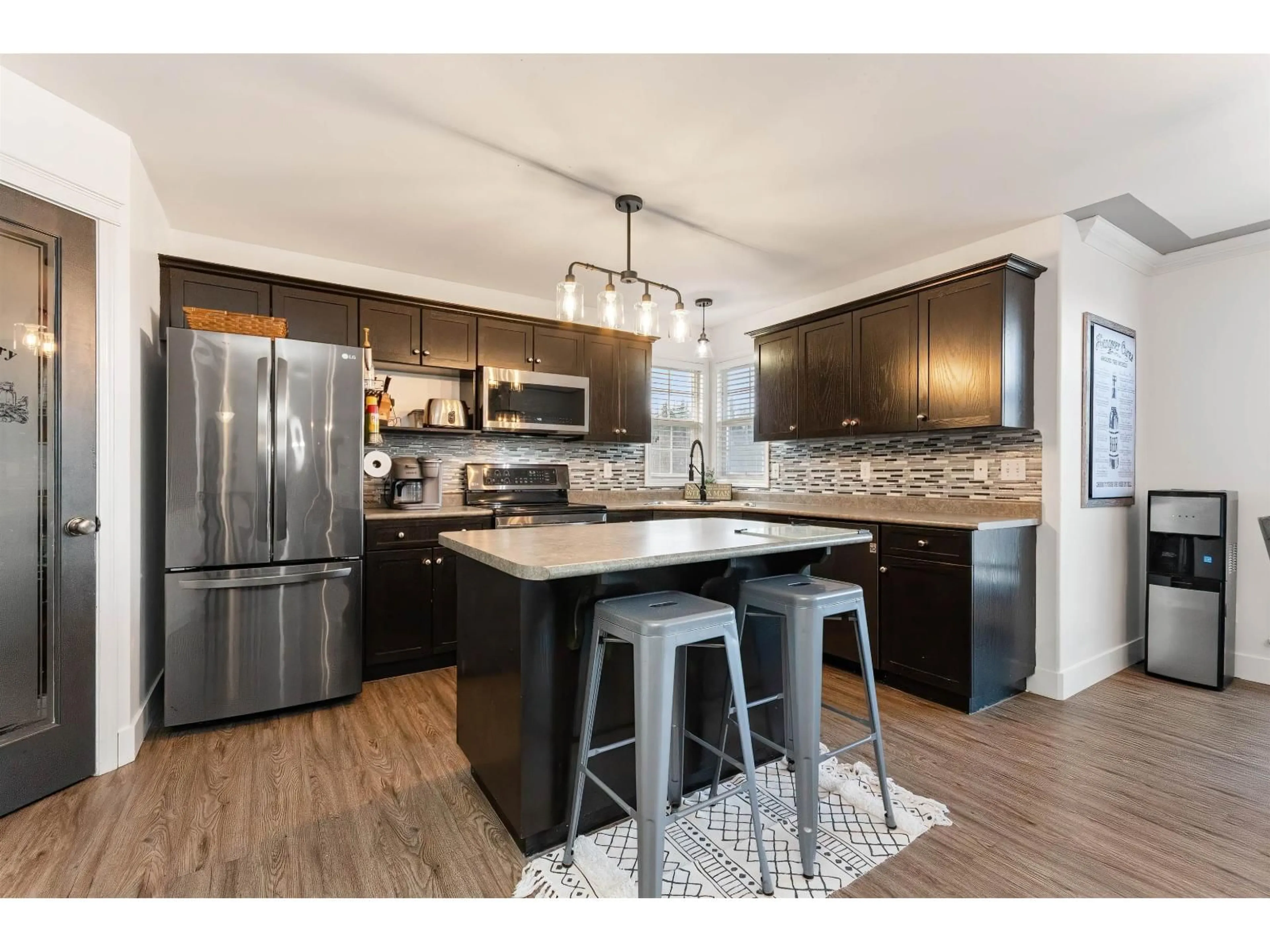 Open concept kitchen, wood/laminate floor for 46303 VALLEYVIEW ROAD, Chilliwack British Columbia V2R5R9