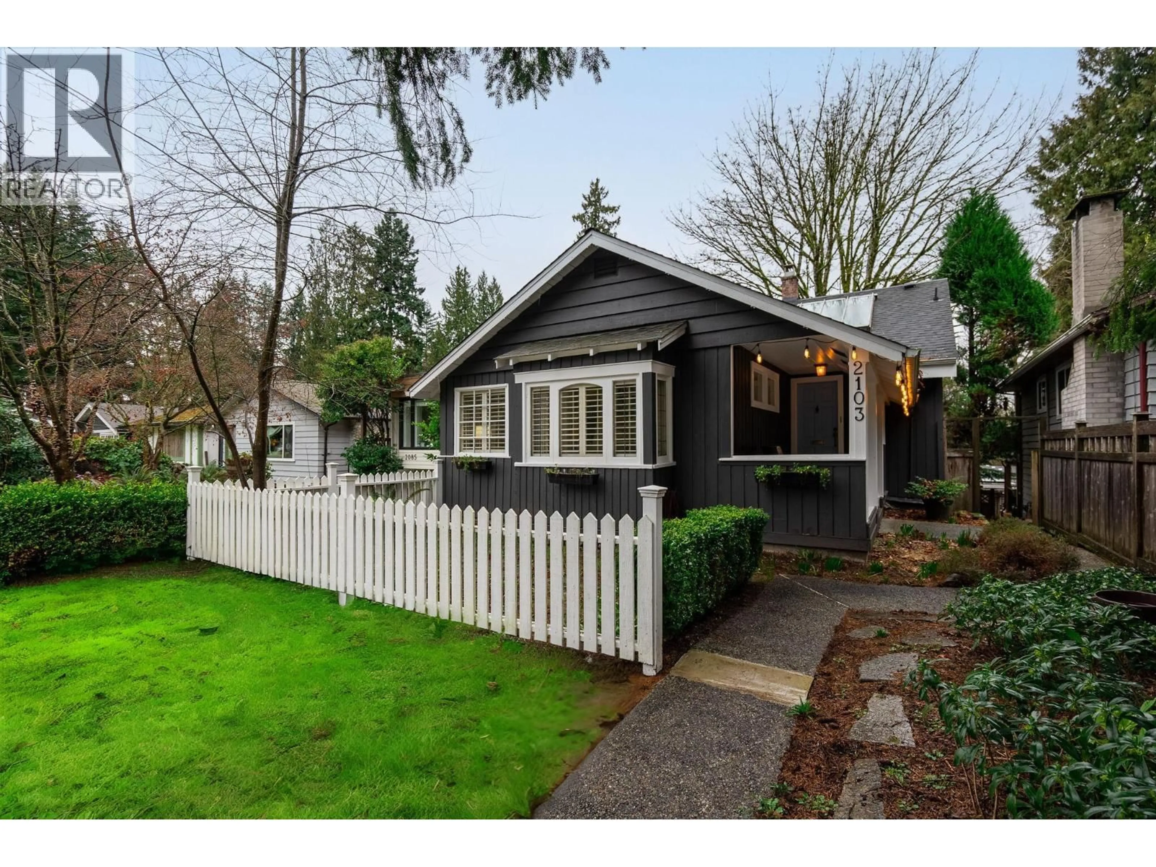 Home with vinyl exterior material, street for 2103 KEITH ROAD, North Vancouver British Columbia V7P1Z4