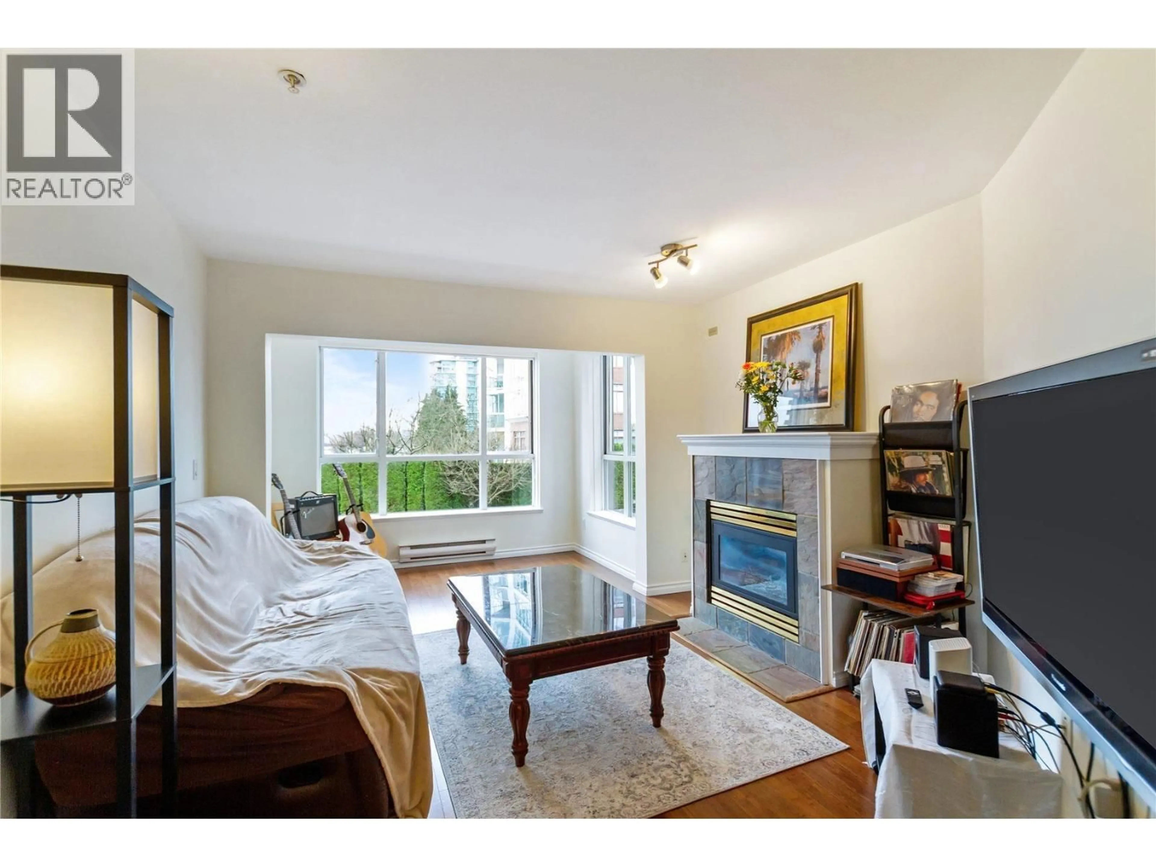 Living room with furniture, unknown for 204 - 155 3RD STREET, North Vancouver British Columbia V7L1E5