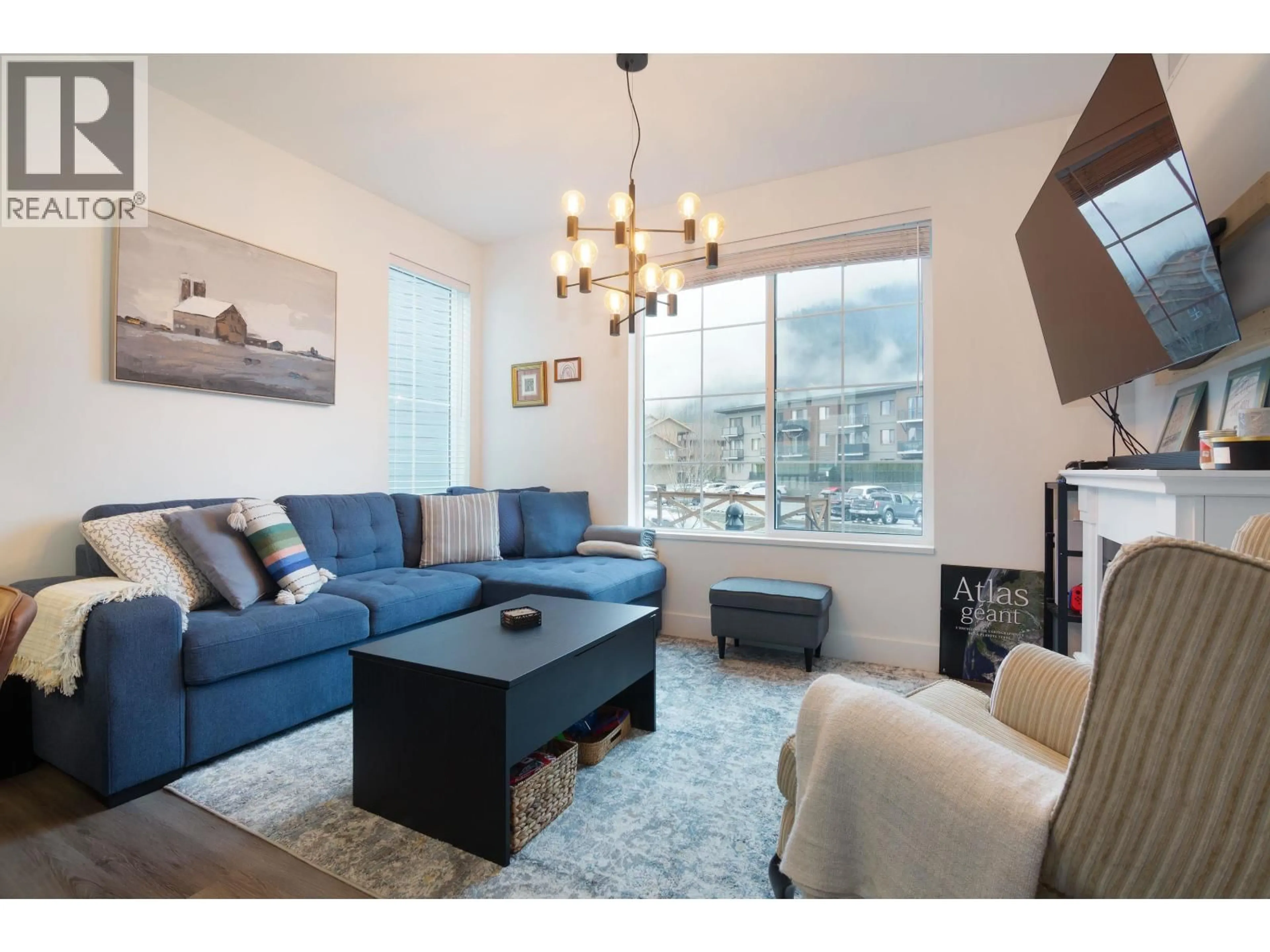 Living room with furniture, wood/laminate floor for 11 - 7360 CRABAPPLE COURT, Pemberton British Columbia V0N2L1