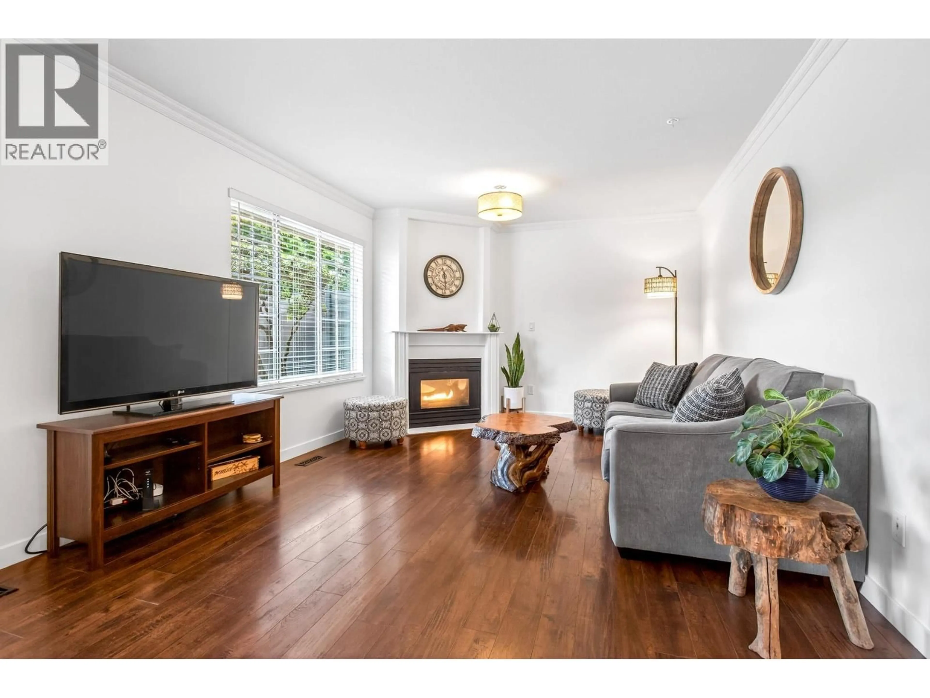 Living room with furniture, wood/laminate floor for 51 - 12268 189A STREET, Pitt Meadows British Columbia V3Y2M7