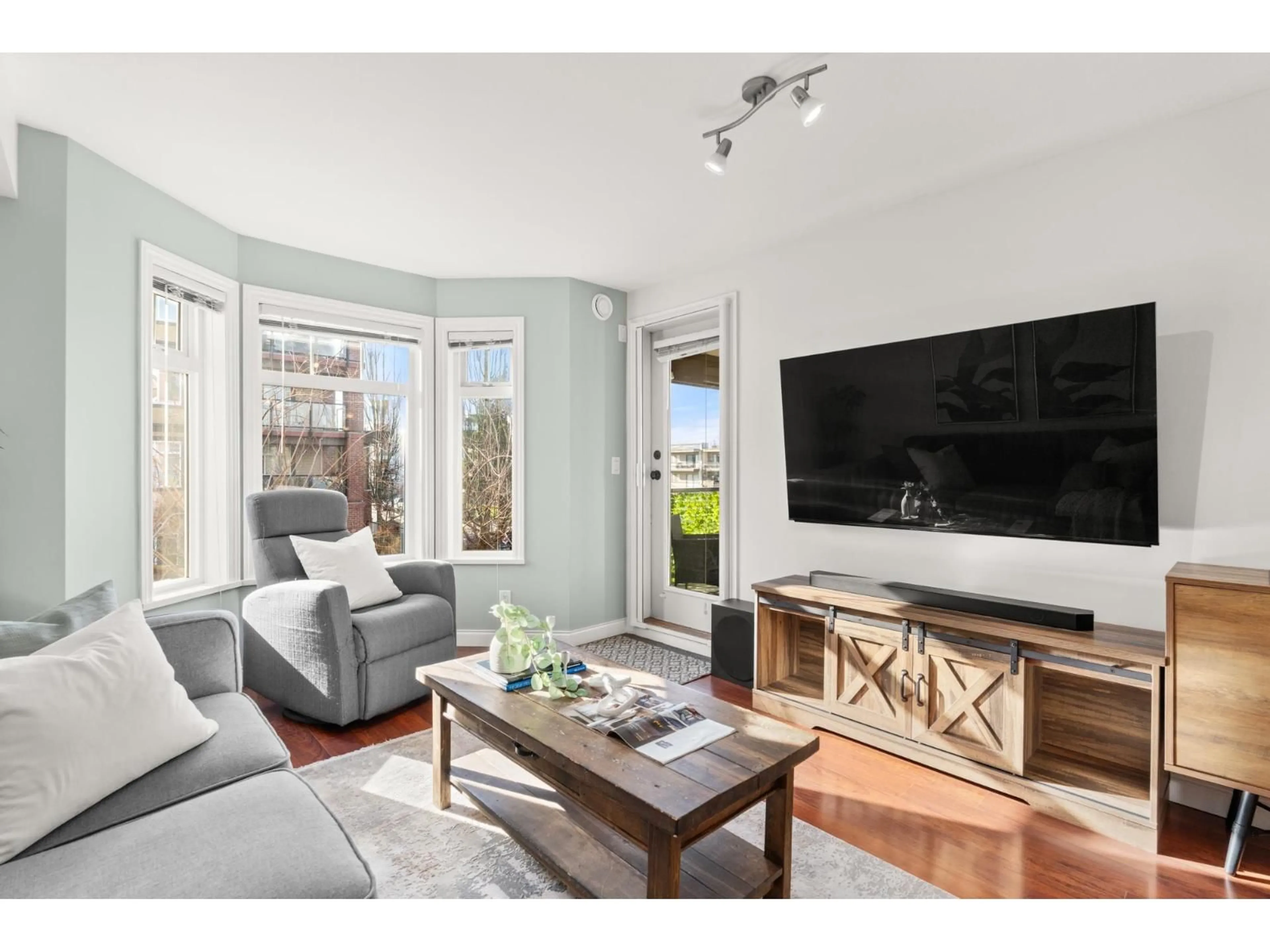 Living room with furniture, wood/laminate floor for 236 - 5660 201A STREET, Langley British Columbia V3A0B4