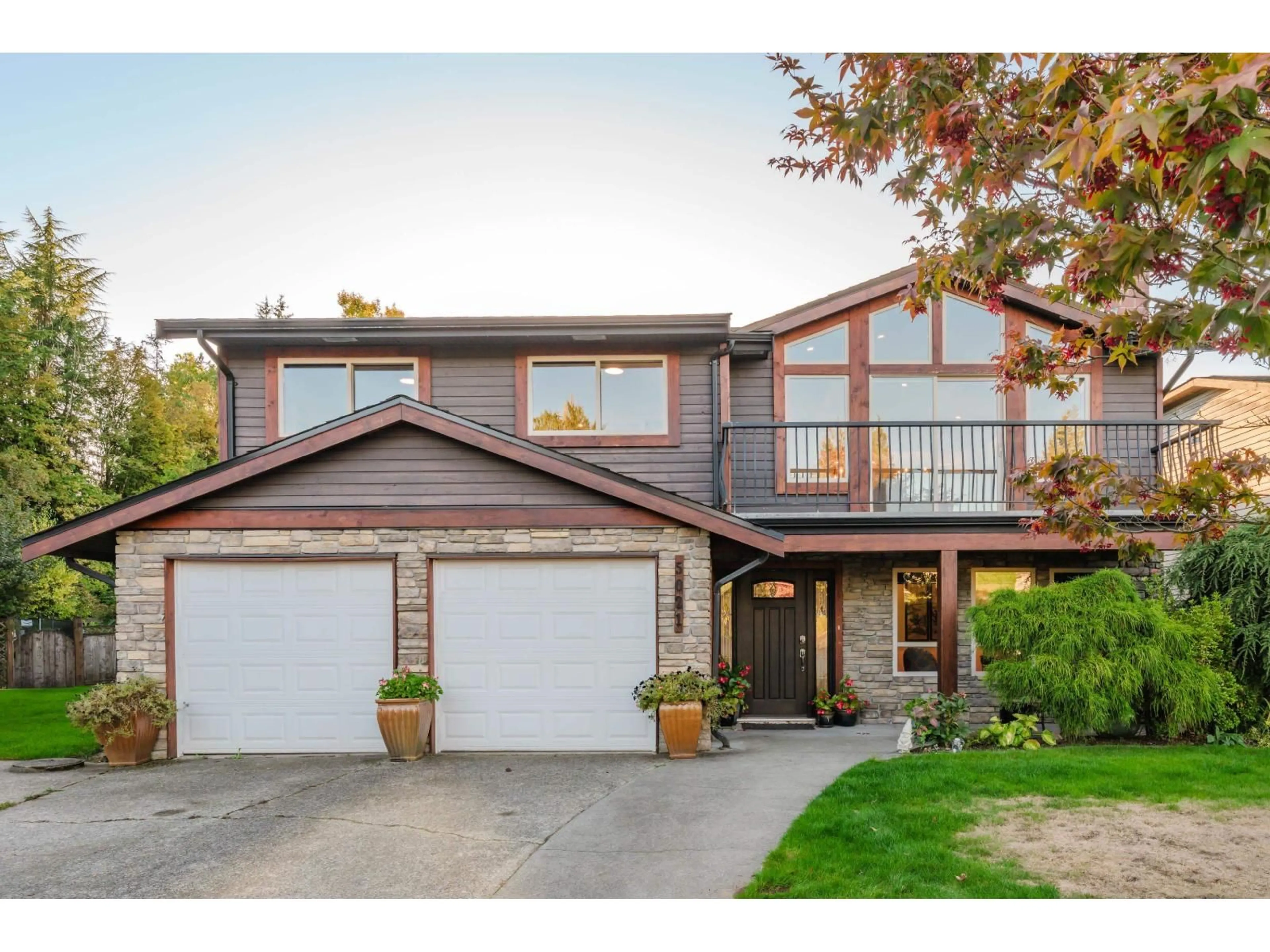 Home with vinyl exterior material, street for 5021 197 STREET, Langley British Columbia V3A7M1