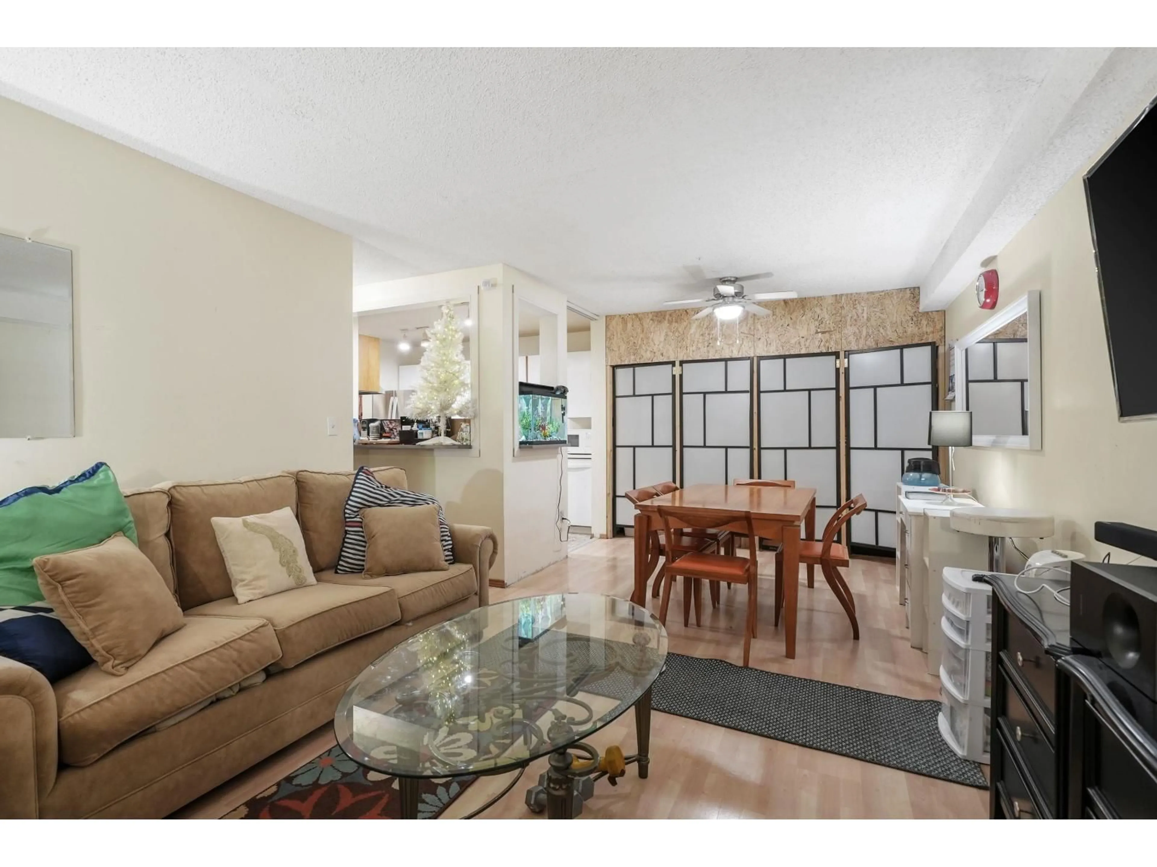 Living room with furniture, ceramic/tile floor for 106 - 10626 151A STREET, Surrey British Columbia V3R8K7