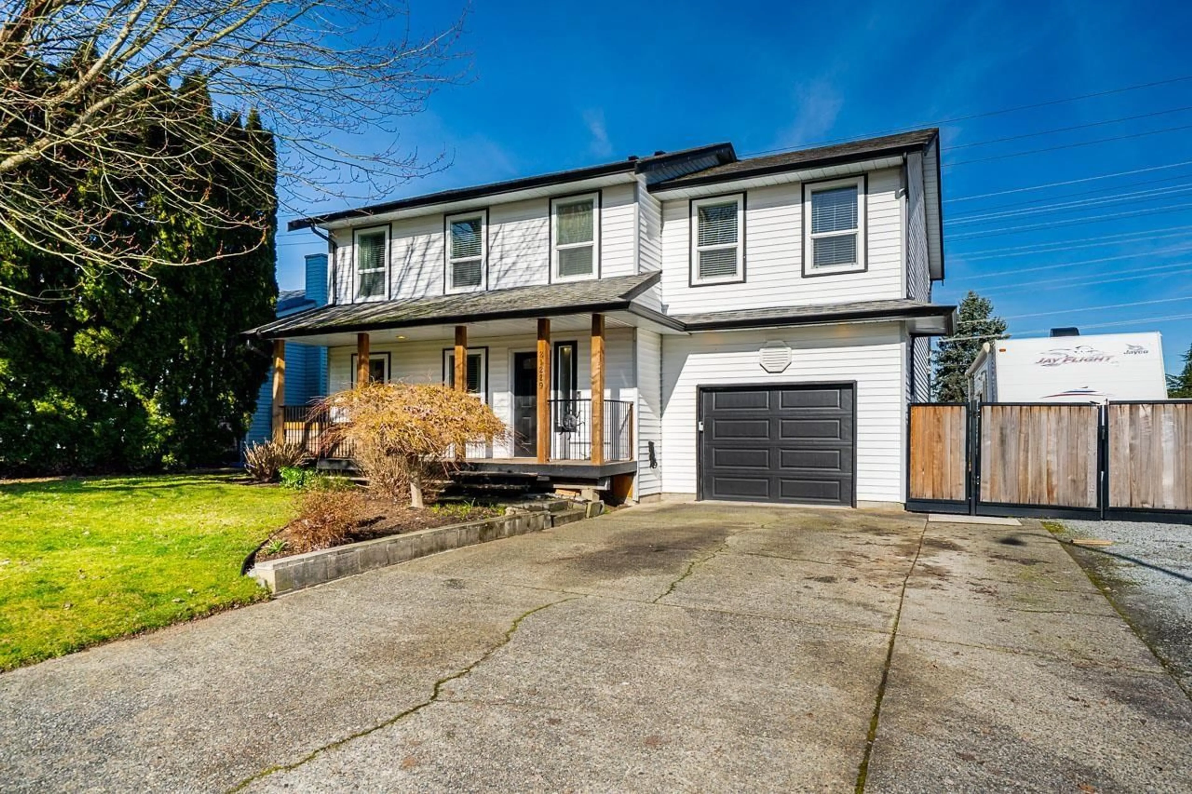 Home with vinyl exterior material, street for 21229 95 AVENUE, Langley British Columbia V1M1M9