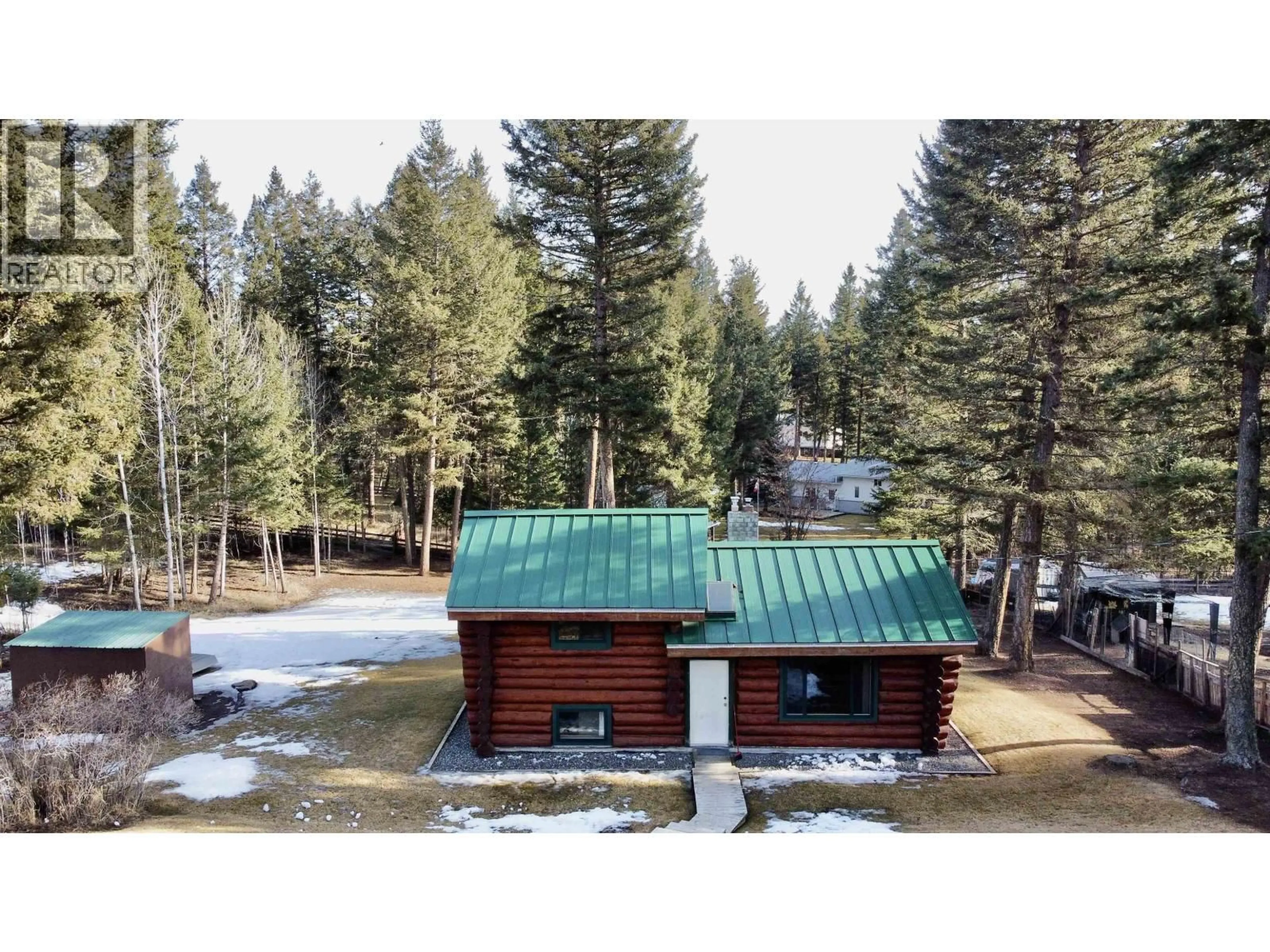 A pic from outside/outdoor area/front of a property/back of a property/a pic from drone, forest/trees view for 4895 MEESQUONO TRAIL, 108 Mile Ranch British Columbia V0K2Z0