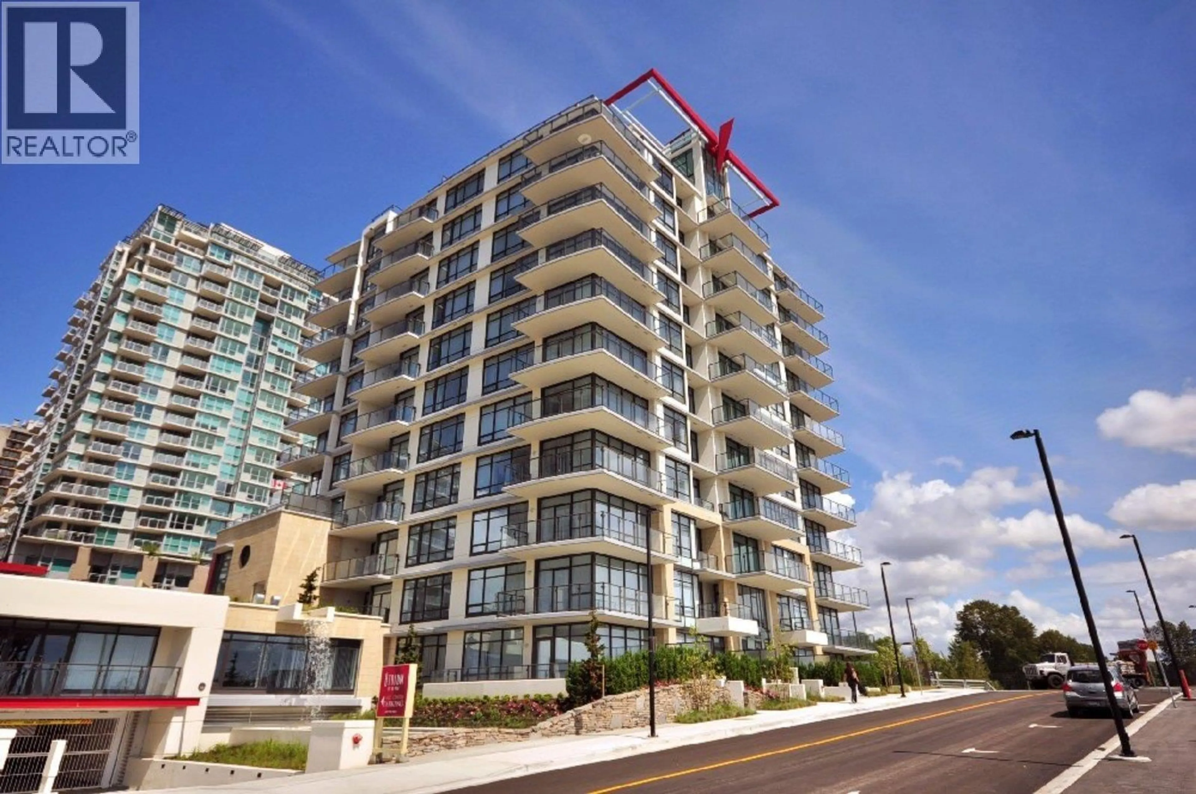 A pic from outside/outdoor area/front of a property/back of a property/a pic from drone, building for 1003 - 172 VICTORY SHIP WAY, North Vancouver British Columbia V7L0B5