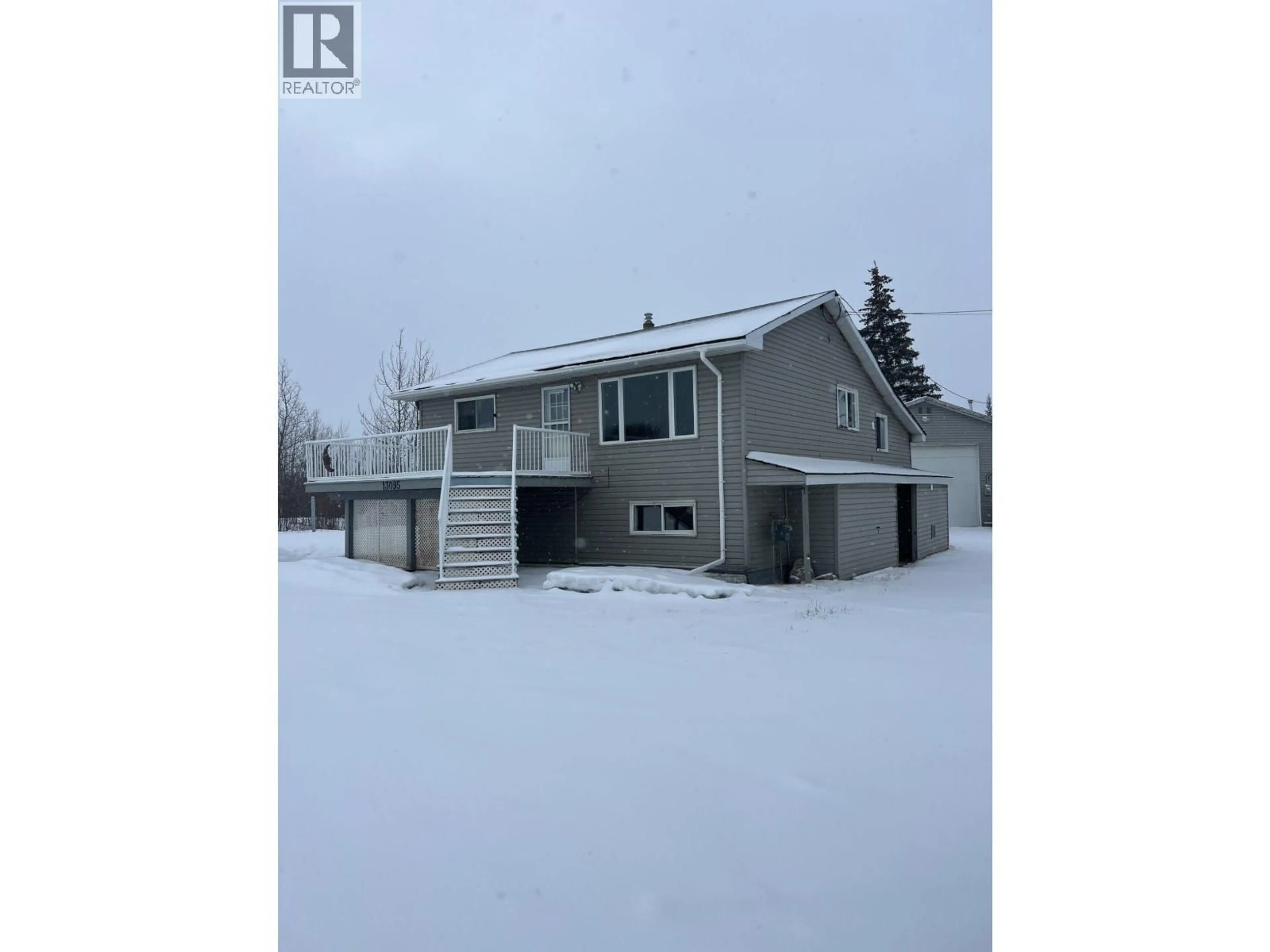 A pic from outside/outdoor area/front of a property/back of a property/a pic from drone, unknown for 13095 LAKESHORE DRIVE, Fort St. John British Columbia V1J1H0